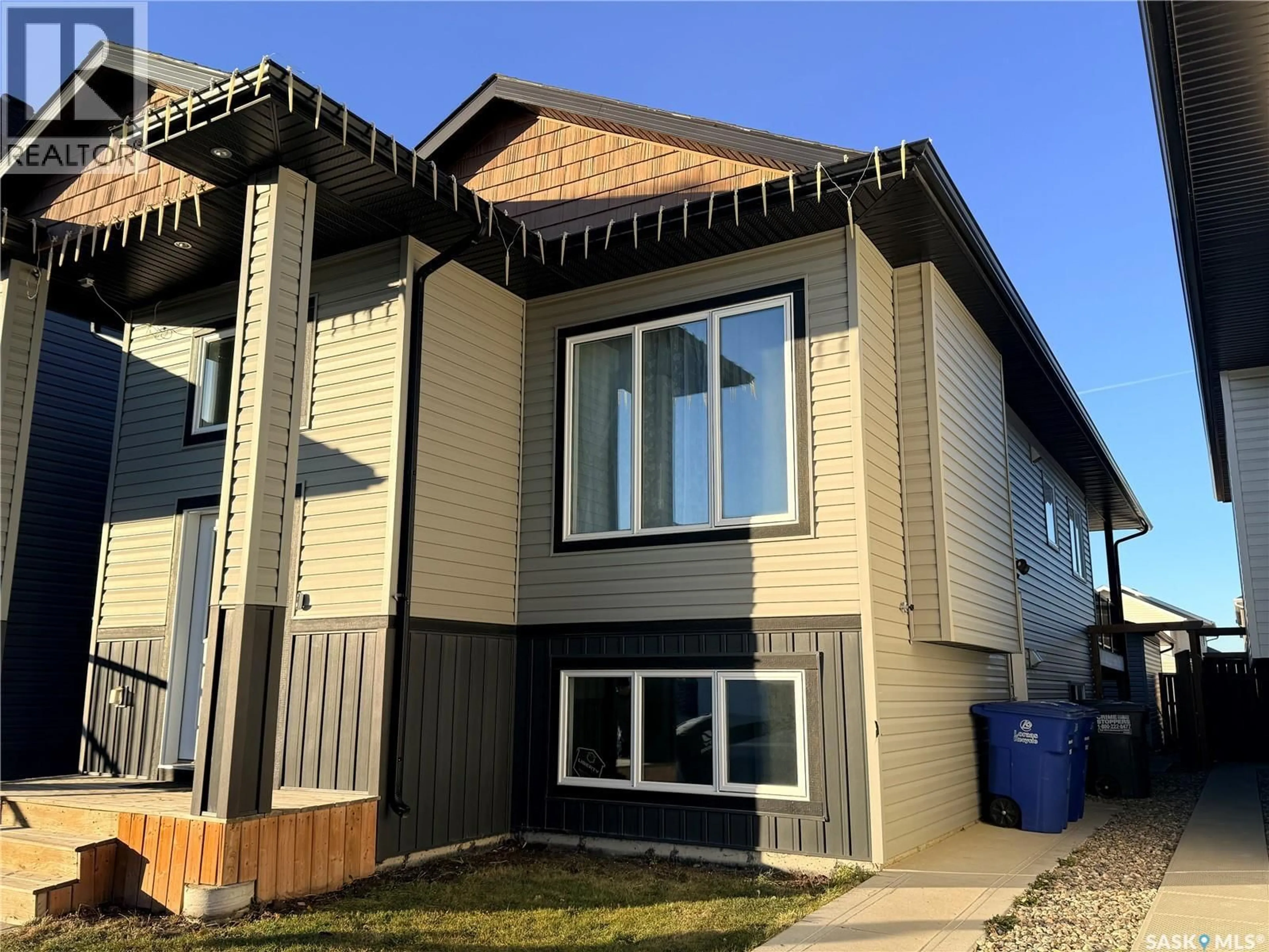 Home with vinyl exterior material, building for 263 THAKUR STREET, Saskatoon Saskatchewan S7W1C5