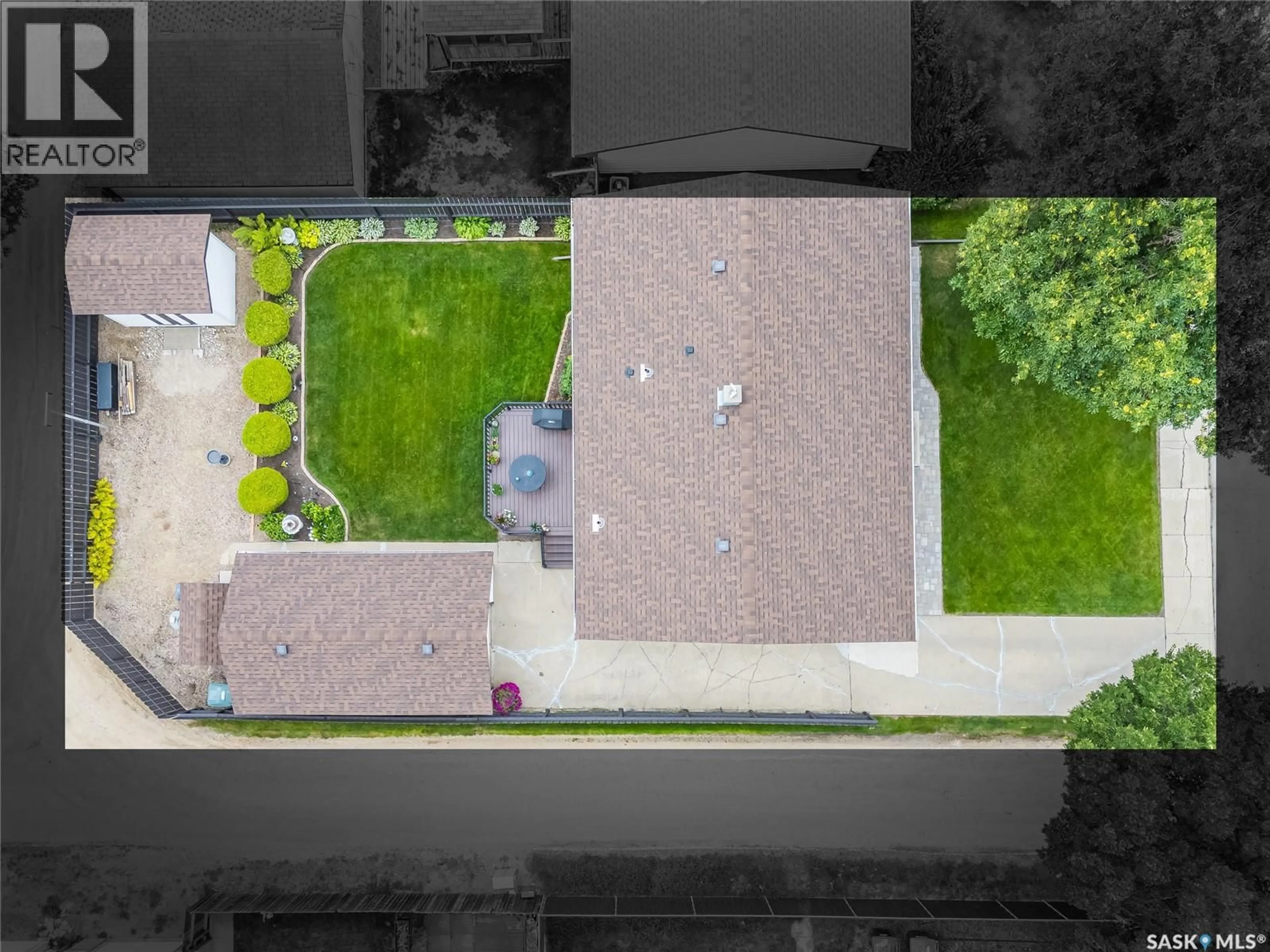 A pic from outside/outdoor area/front of a property/back of a property/a pic from drone, street for 102 BENCE CRESCENT, Saskatoon Saskatchewan S7L4J1