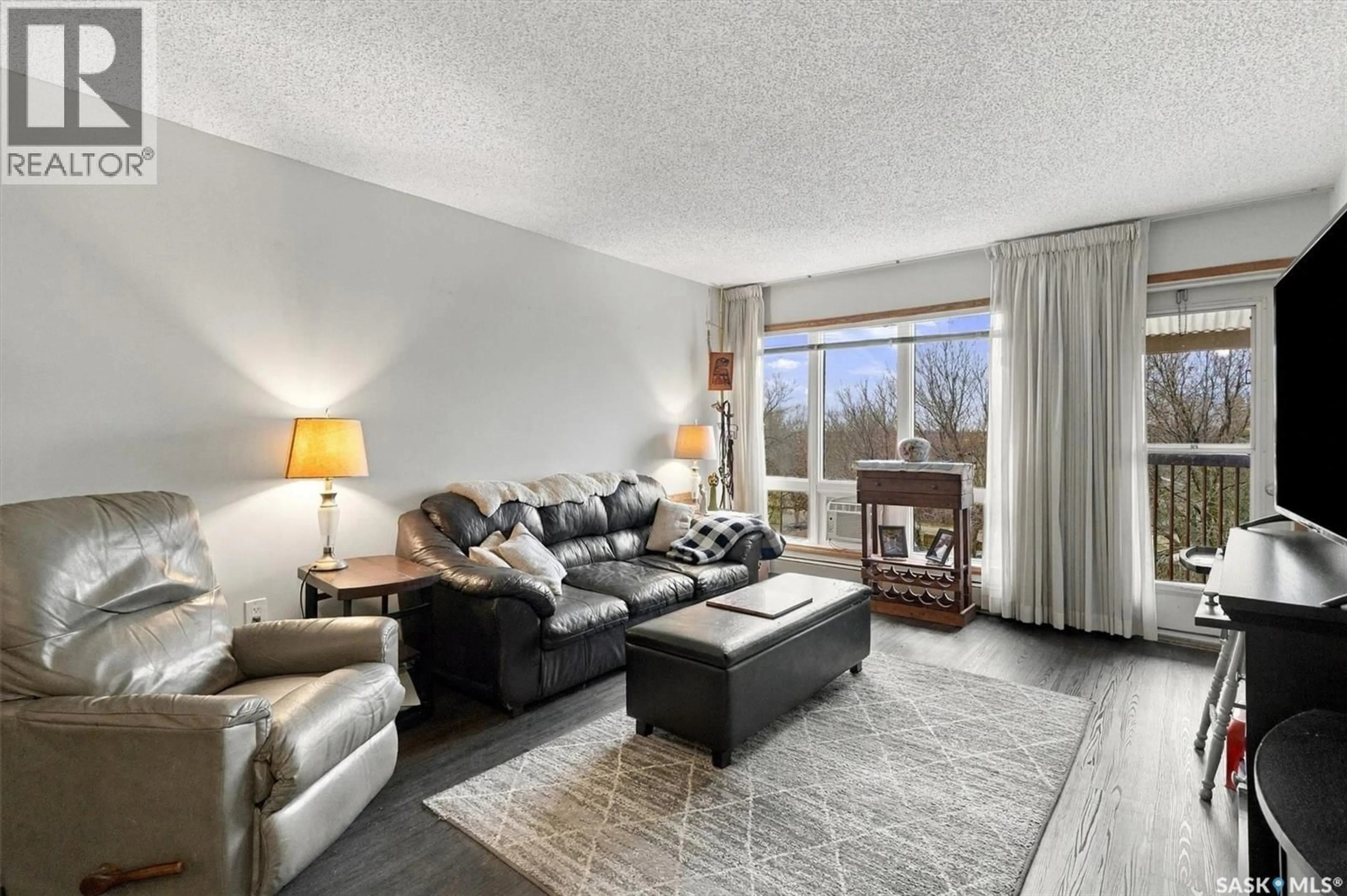 Living room with furniture, unknown for 306 - 3220 33RD STREET, Saskatoon Saskatchewan S7L6K3