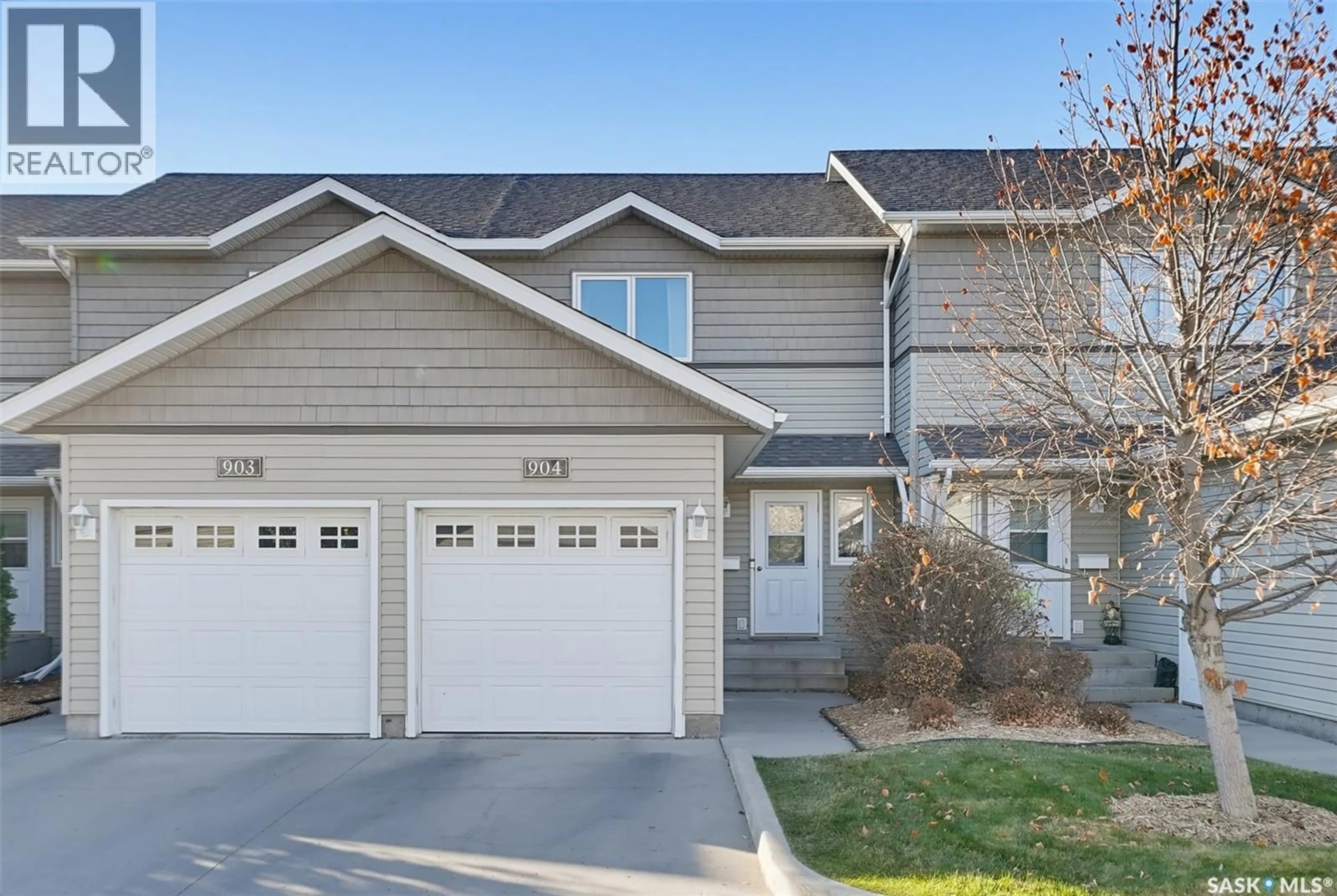 Home with vinyl exterior material, street for 904 715 HART ROAD, Saskatoon Saskatchewan S7M3Y8