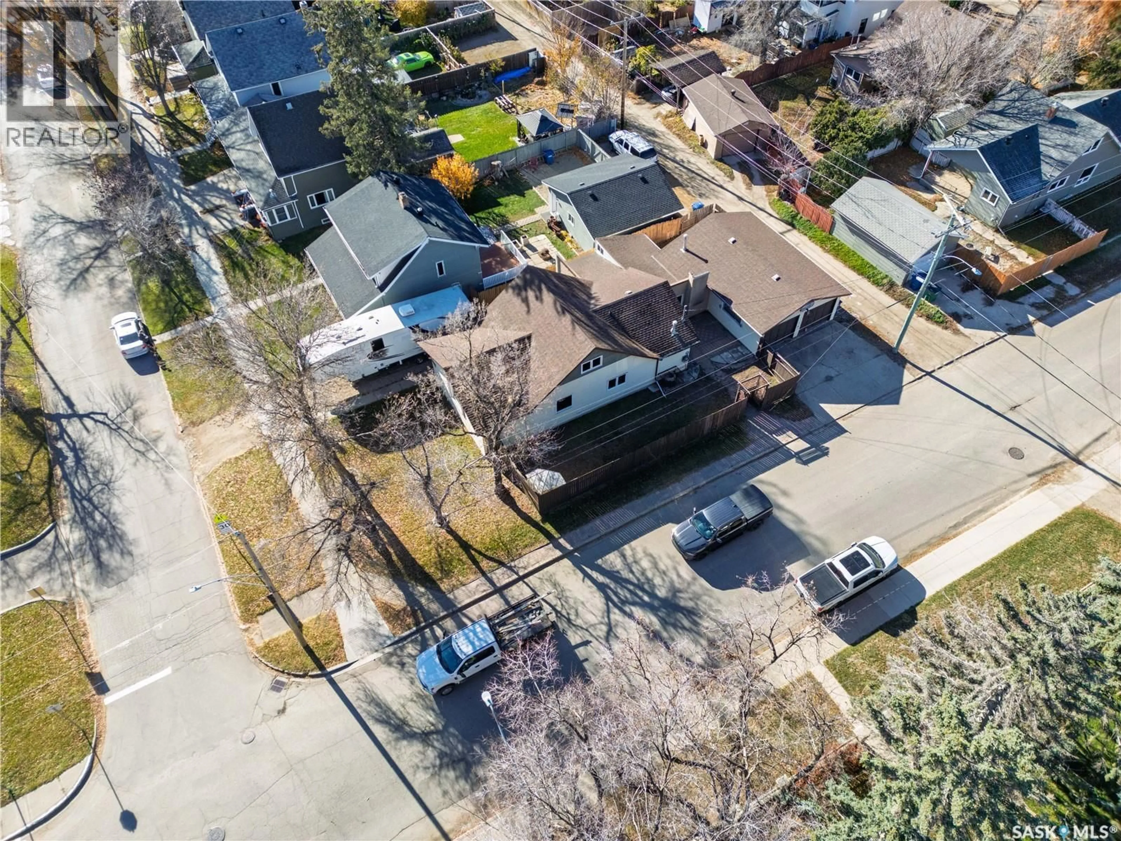A pic from outside/outdoor area/front of a property/back of a property/a pic from drone, street for 1080 HENLEAZE AVENUE, Moose Jaw Saskatchewan S6H3V6