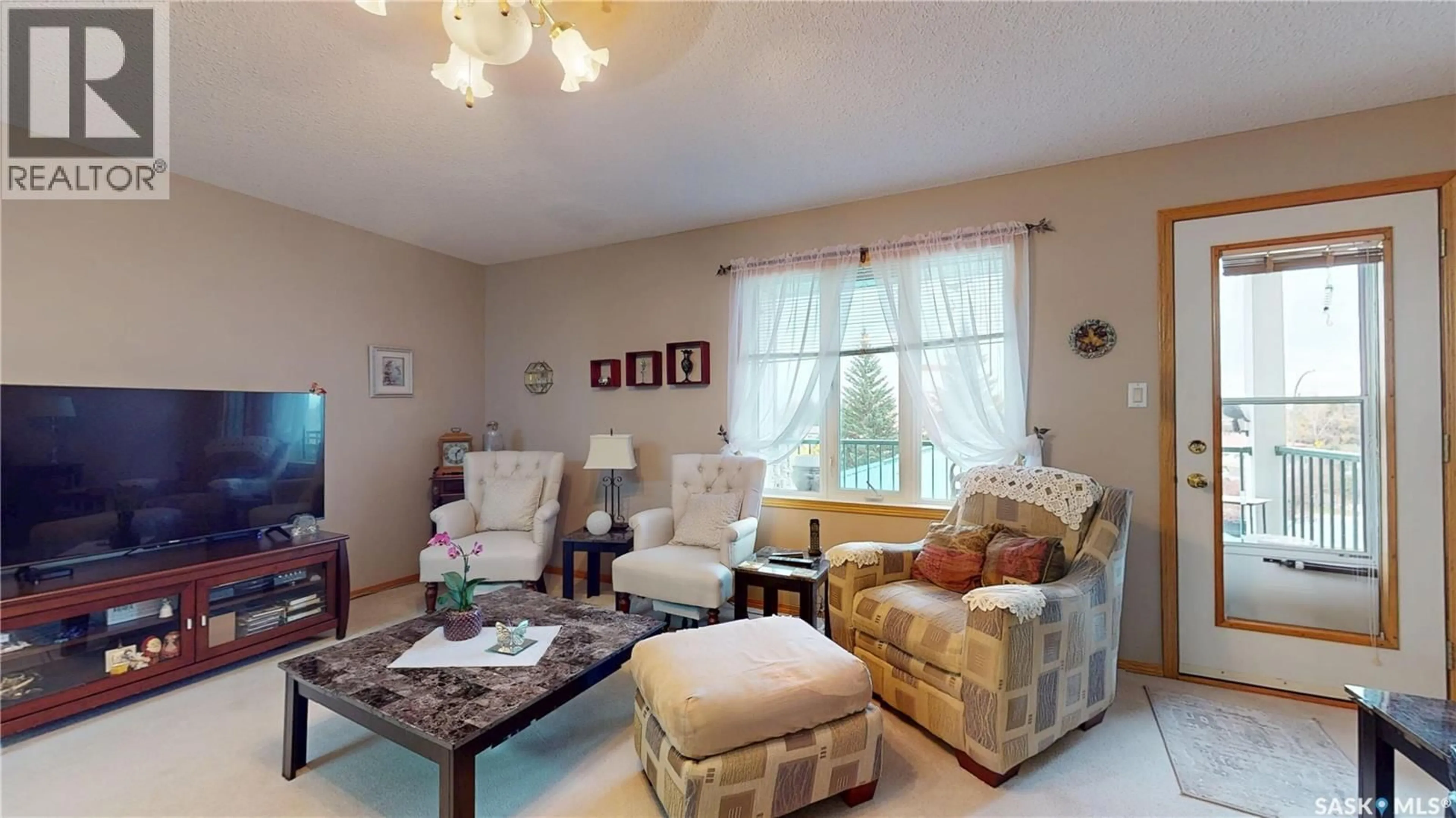Living room with furniture, unknown for 304 - 2930 ARENS ROAD, Regina Saskatchewan S4V1N8