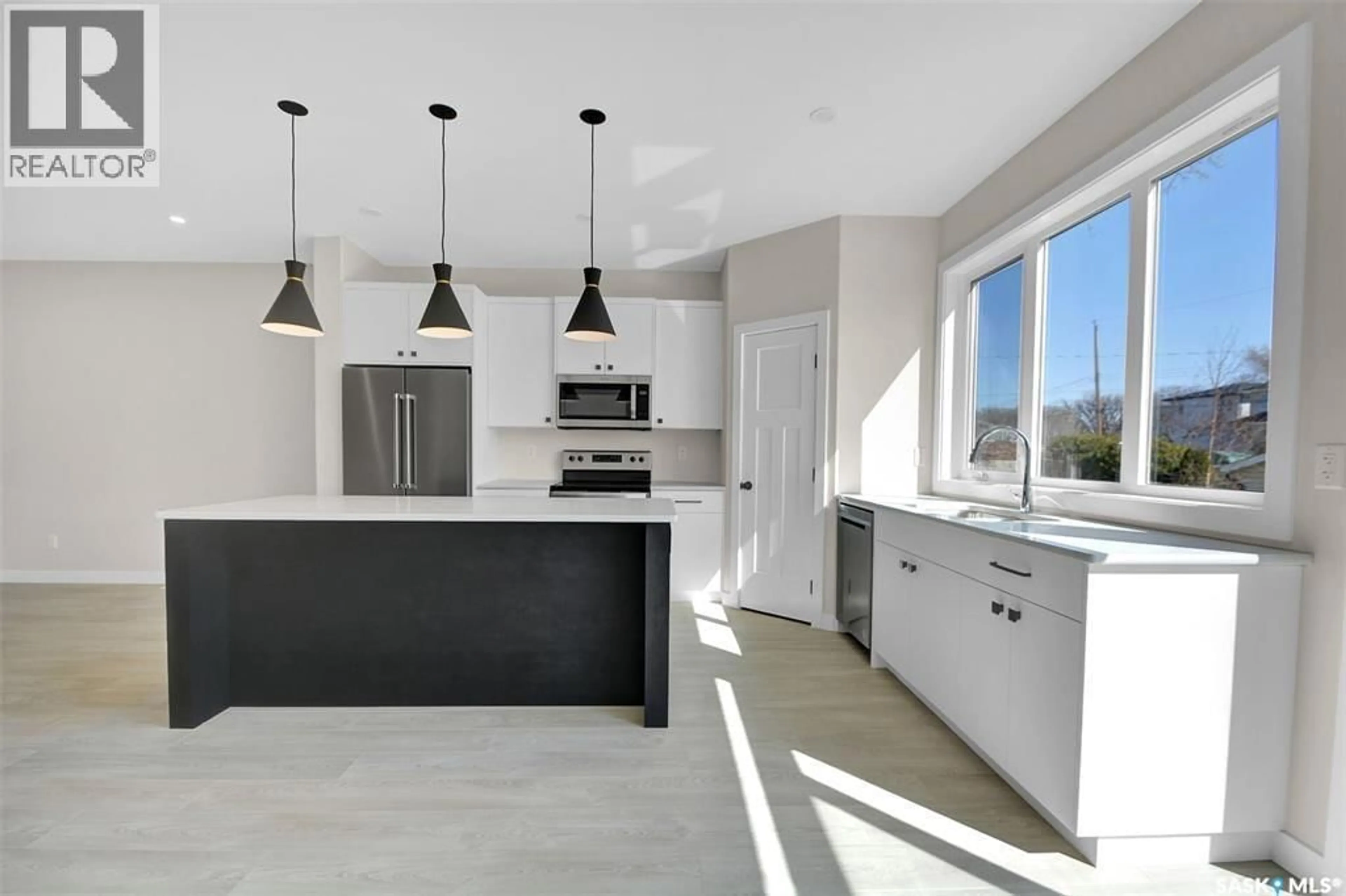 Open concept kitchen, unknown for 129A 107TH STREET, Saskatoon Saskatchewan S7N1P2