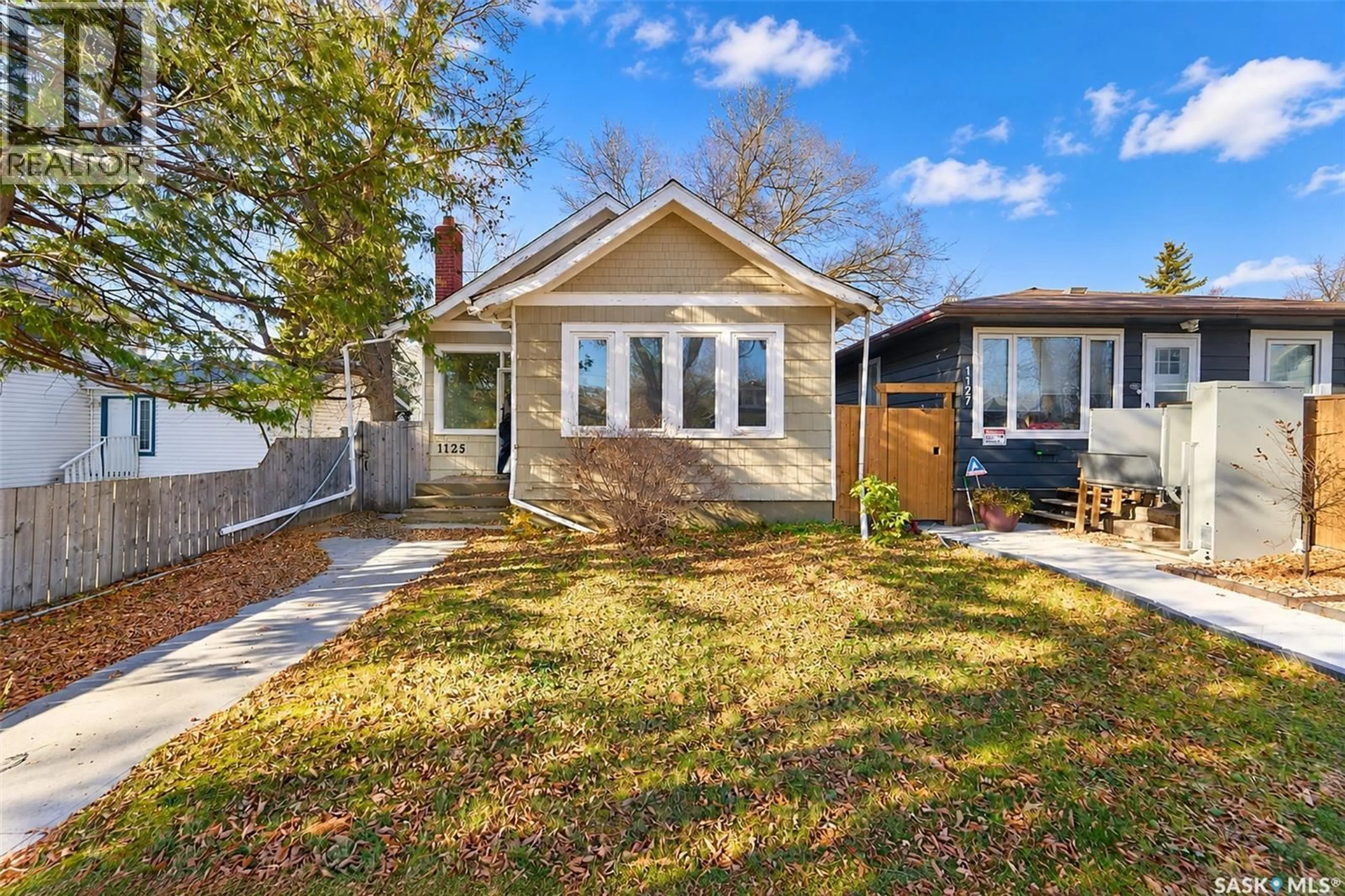 Home with vinyl exterior material, street for 1125 B AVENUE, Saskatoon Saskatchewan S7L1G2