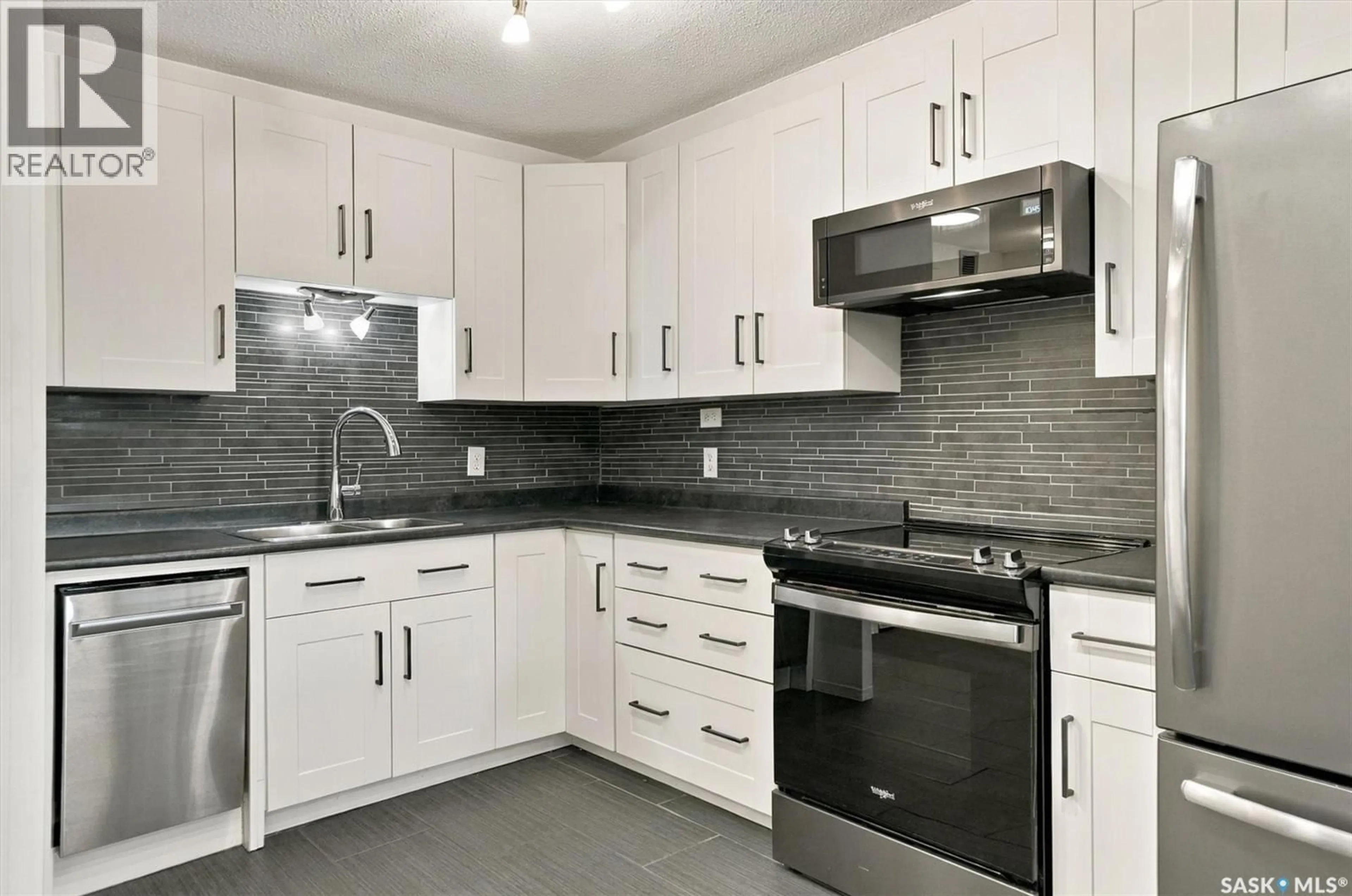 Standard kitchen, ceramic/tile floor for N - 502 537 4TH AVENUE, Saskatoon Saskatchewan S7K2M6