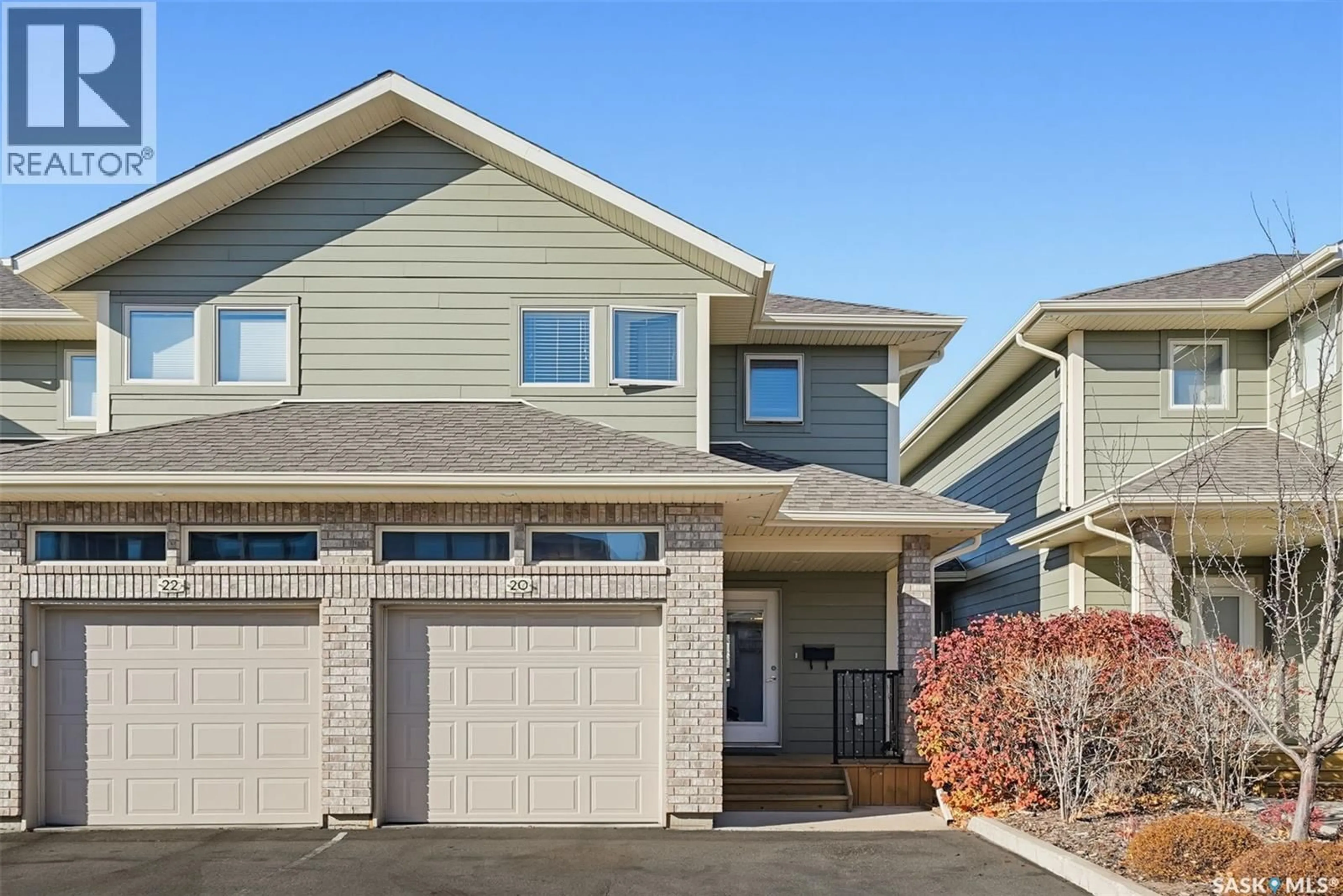 Home with vinyl exterior material, street for 20 1550 PATON CRESCENT, Saskatoon Saskatchewan S7W0T8