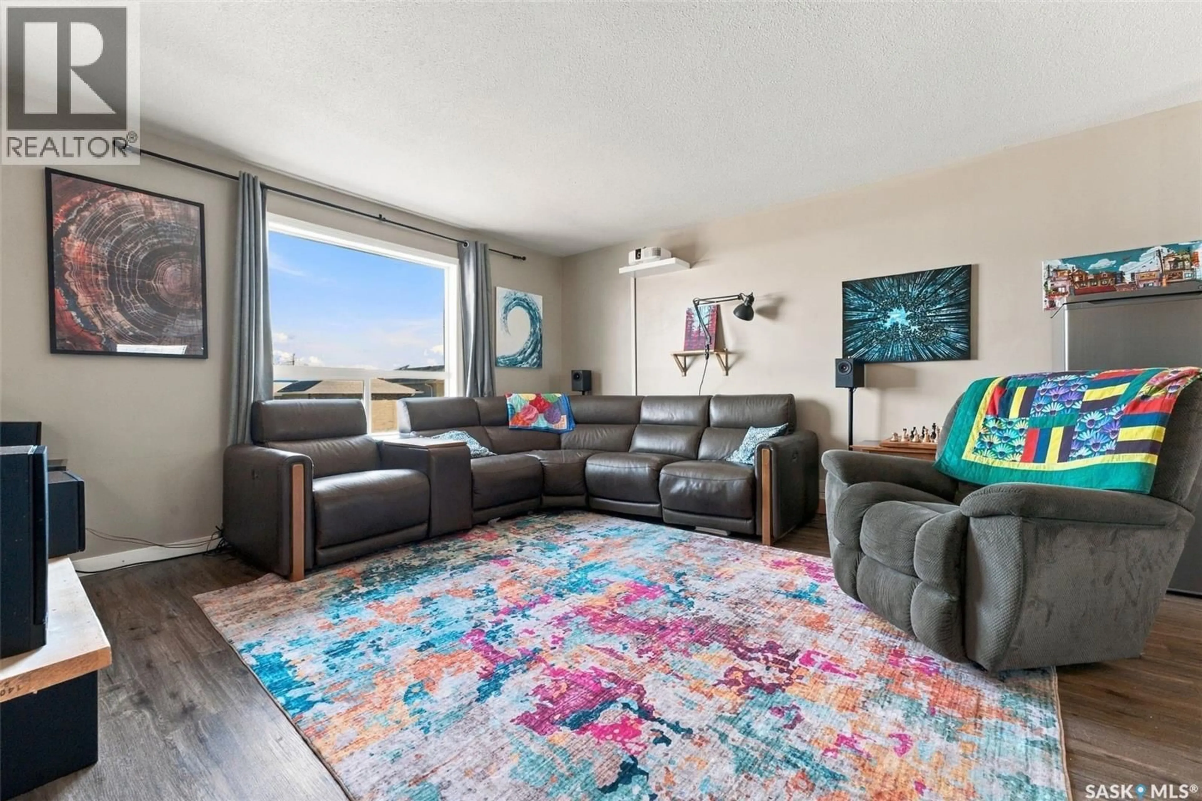 Living room with furniture, unknown for 7 132 HIEBERT CRESCENT, Martensville Saskatchewan S0K2T2