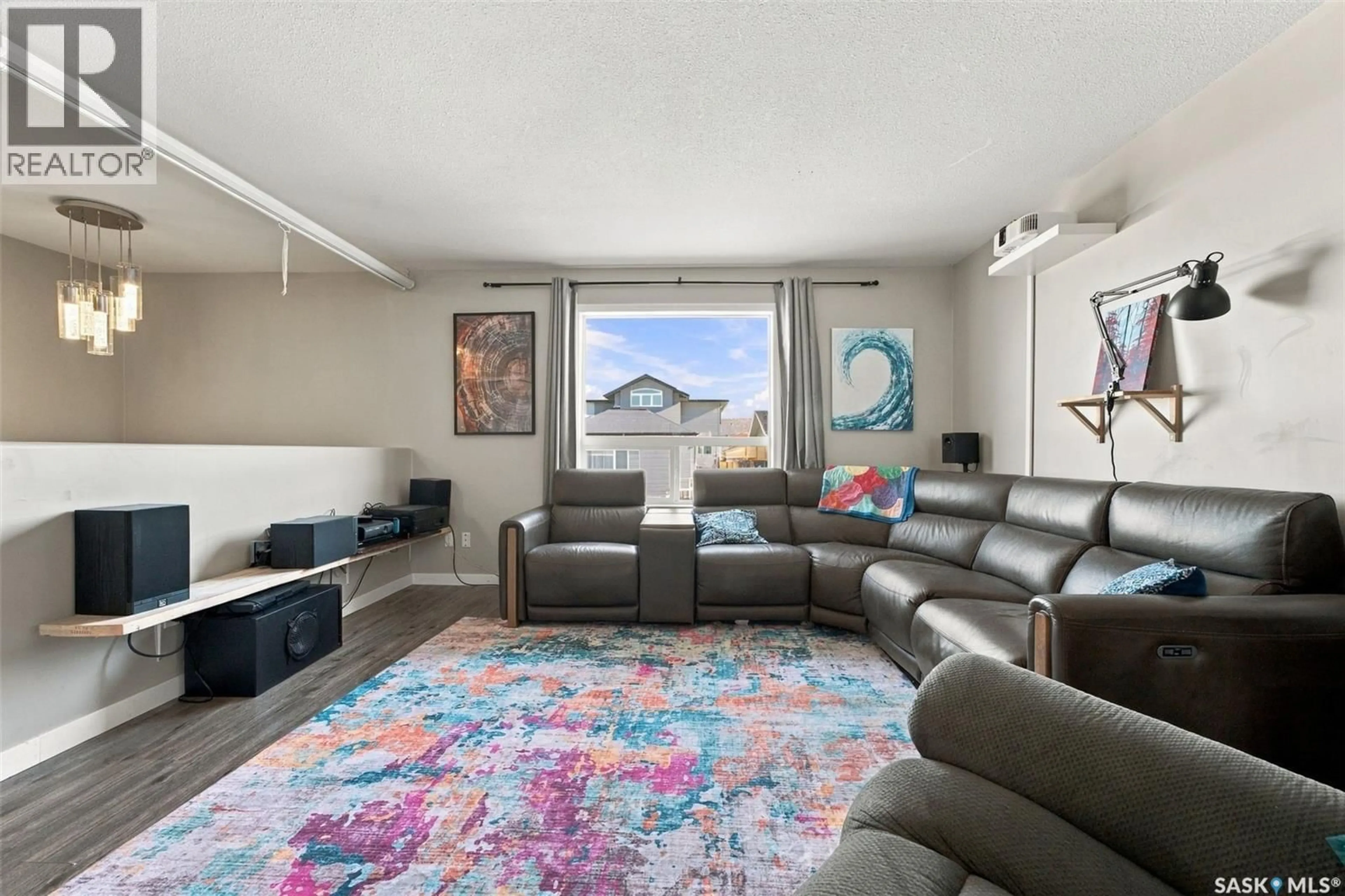 Living room with furniture, unknown for 7 132 HIEBERT CRESCENT, Martensville Saskatchewan S0K2T2