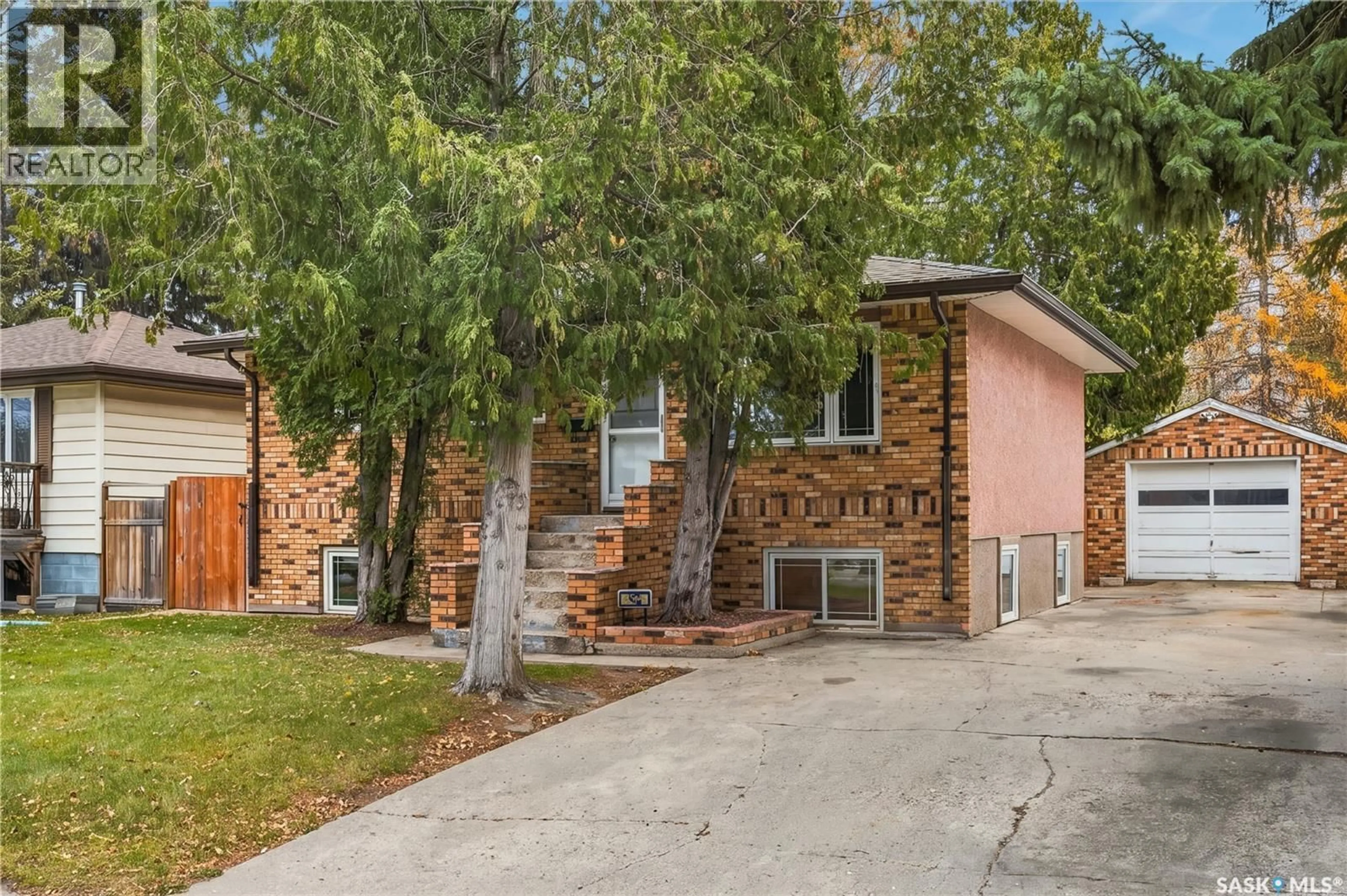 Home with brick exterior material, street for 512 Q AVENUE, Saskatoon Saskatchewan S7L2Y3