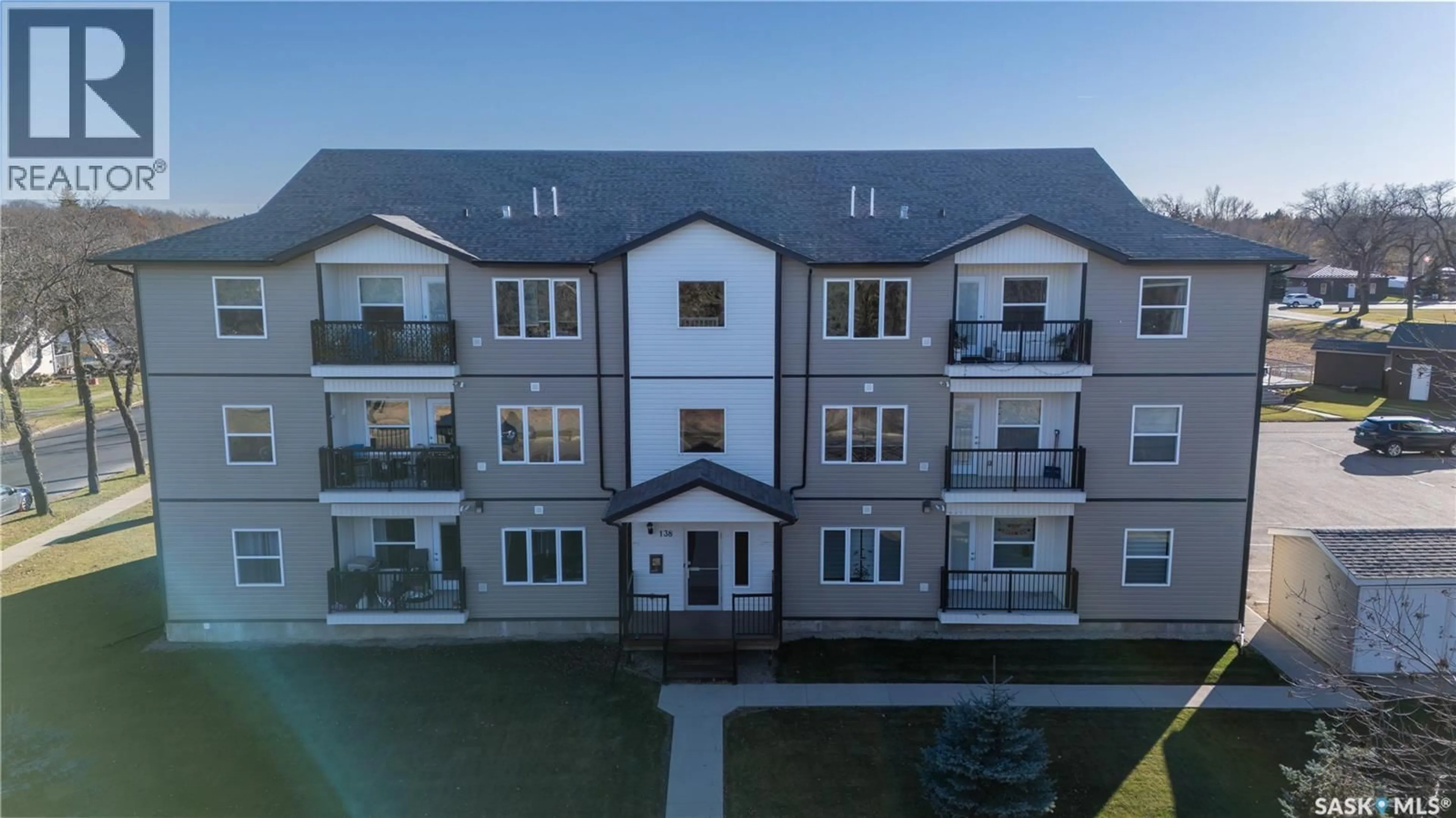 A pic from outside/outdoor area/front of a property/back of a property/a pic from drone, building for 302 138 CATHERINE STREET, Yorkton Saskatchewan S3N4J5