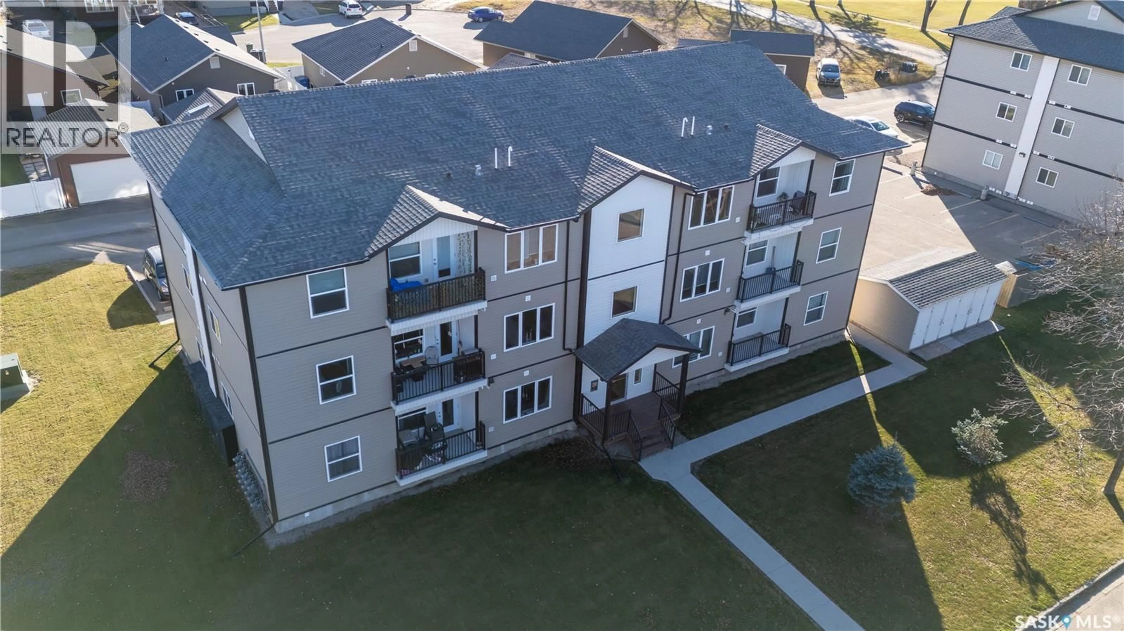 A pic from outside/outdoor area/front of a property/back of a property/a pic from drone, water/lake/river/ocean view for 302 138 CATHERINE STREET, Yorkton Saskatchewan S3N4J5