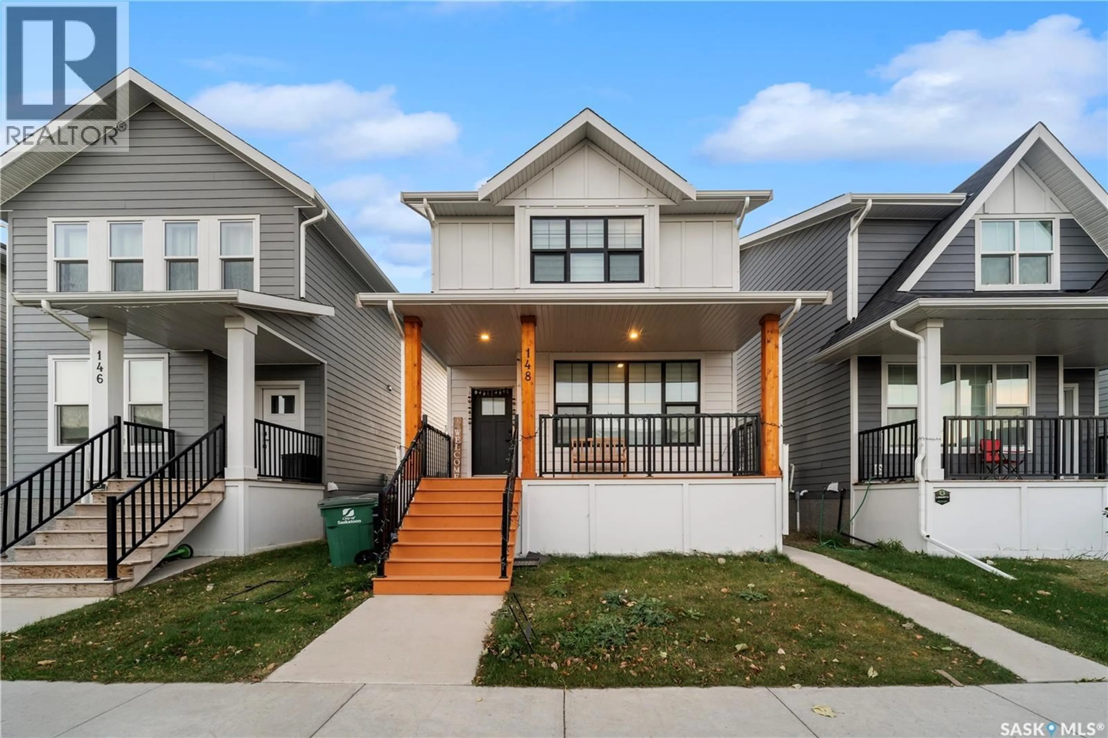 Home with vinyl exterior material, street for 148 ROSEWOOD BOULEVARD, Saskatoon Saskatchewan S7V0Y9