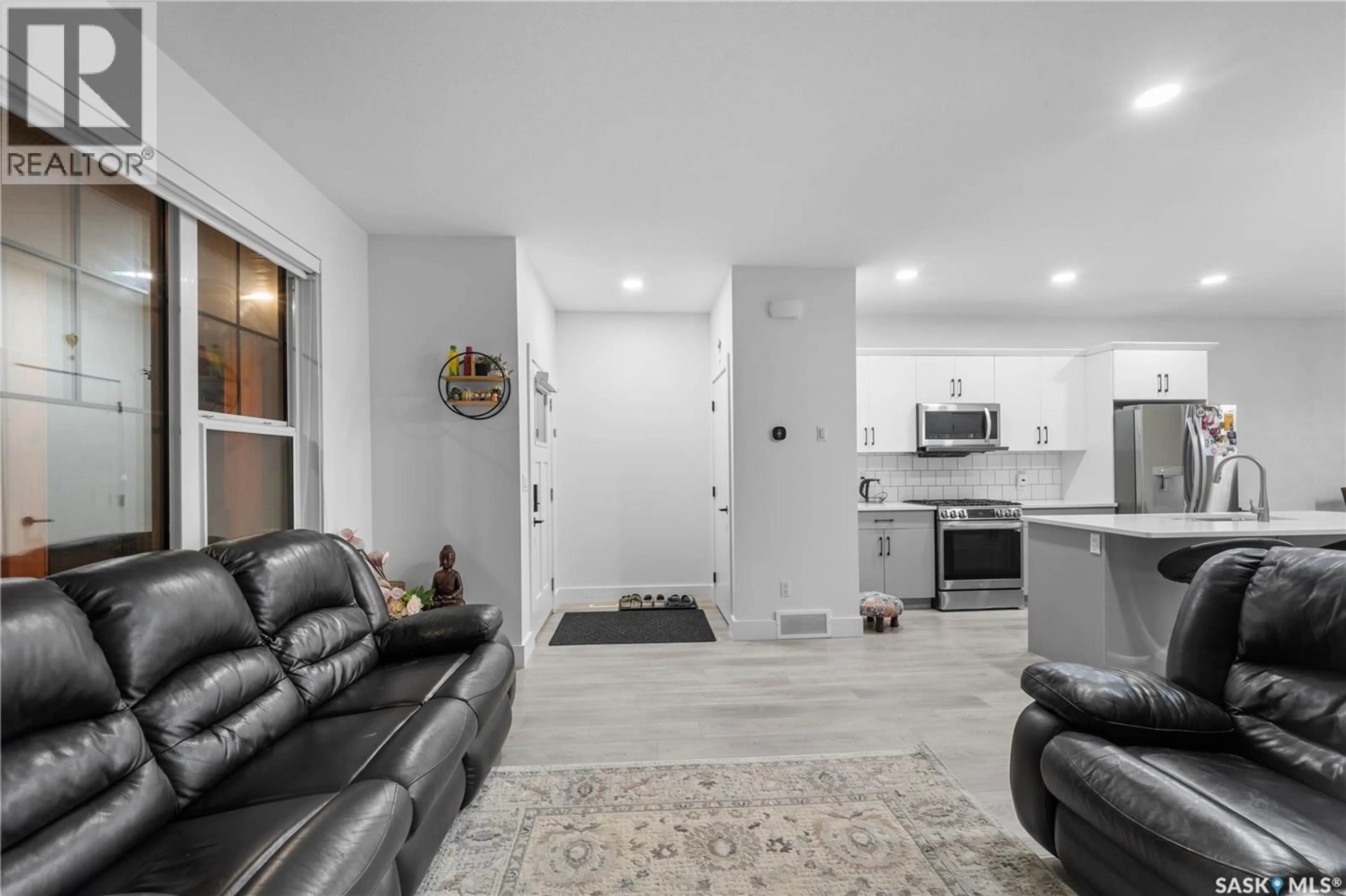 Living room with furniture, ceramic/tile floor for 148 ROSEWOOD BOULEVARD, Saskatoon Saskatchewan S7V0Y9