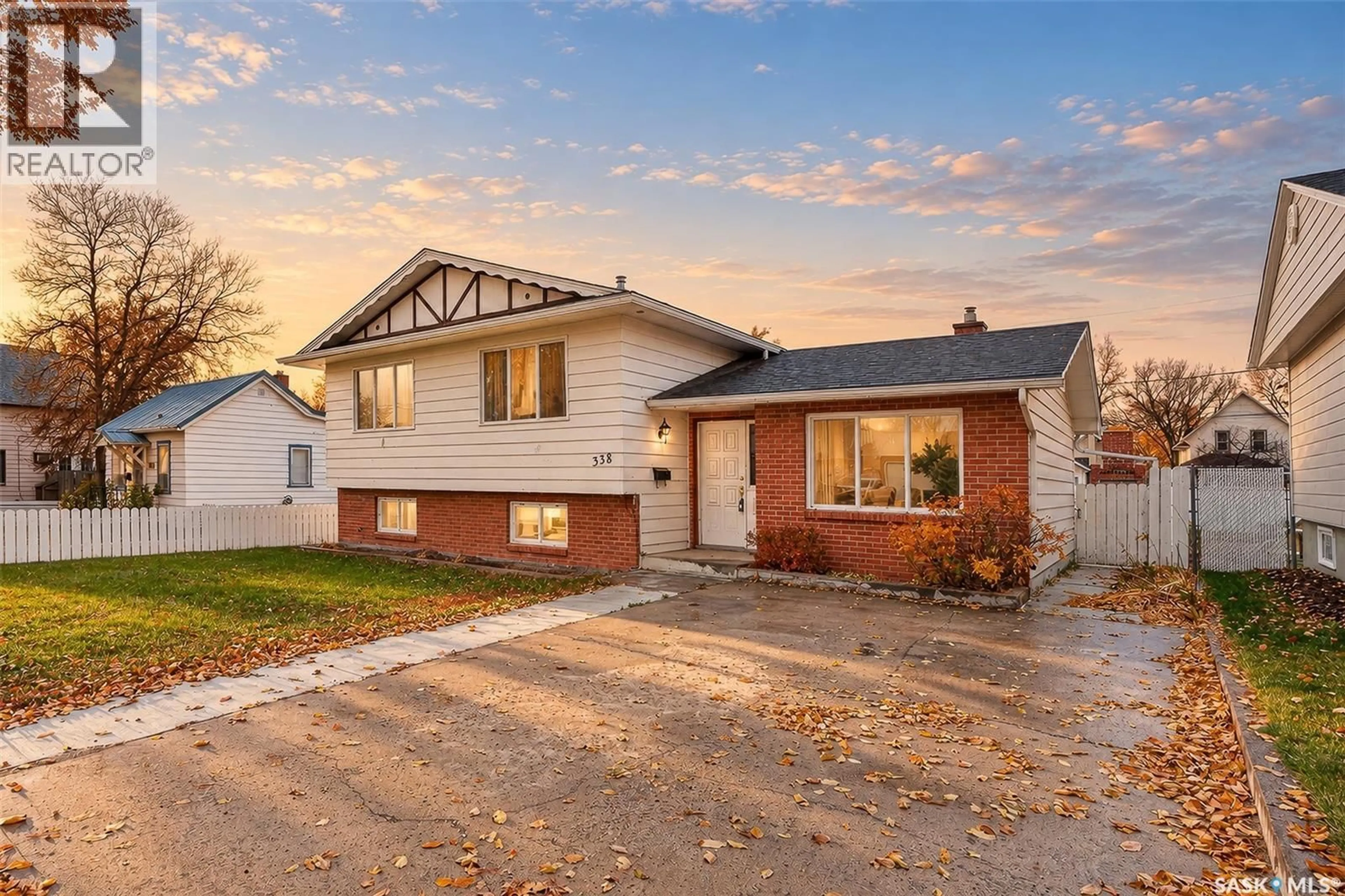 Home with brick exterior material, street for 338 GRANDVIEW STREET, Moose Jaw Saskatchewan S6H5K8