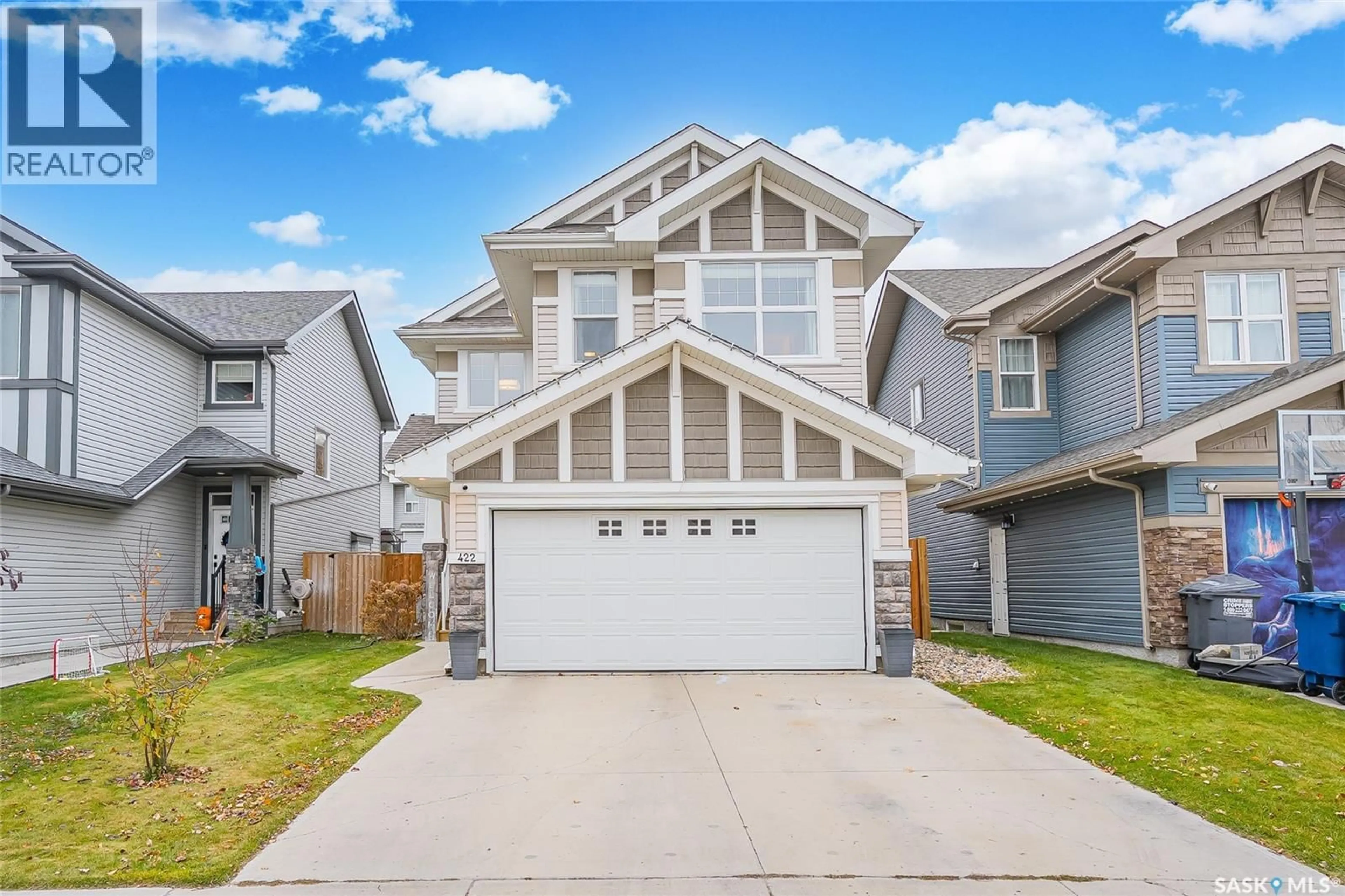 Home with vinyl exterior material, street for 422 SECORD WAY, Saskatoon Saskatchewan S7V0M1