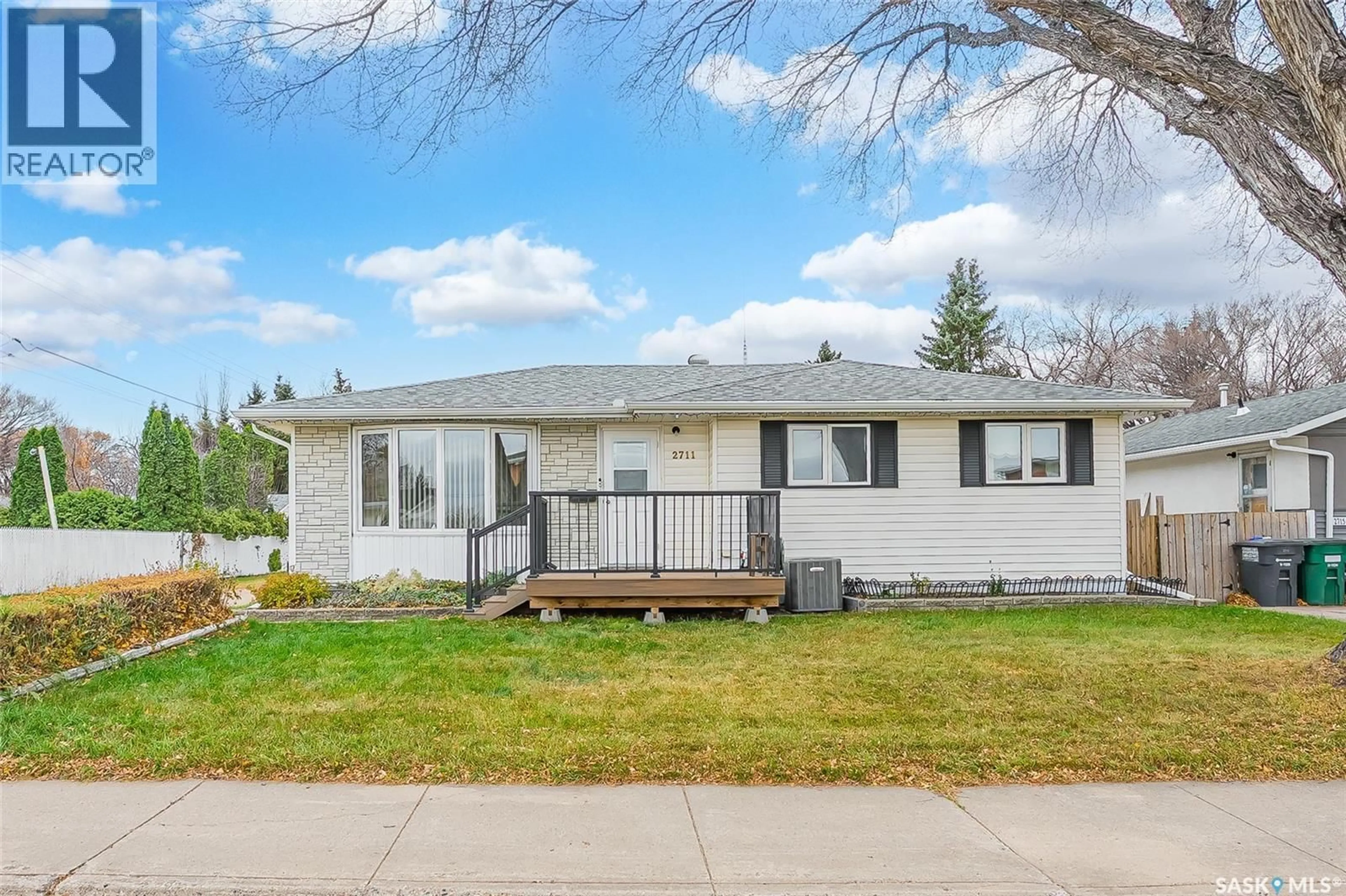 Home with vinyl exterior material, street for 2711 RUSHOLME ROAD, Saskatoon Saskatchewan S7L0H3