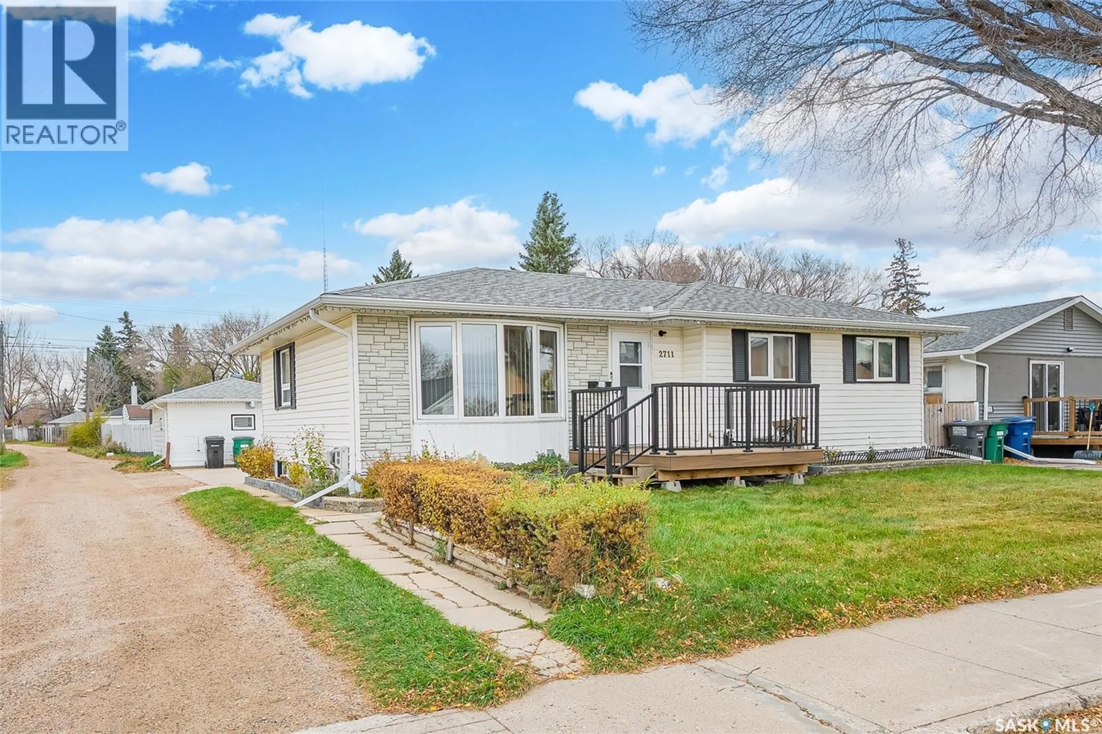 Home with vinyl exterior material, street for 2711 RUSHOLME ROAD, Saskatoon Saskatchewan S7L0H3