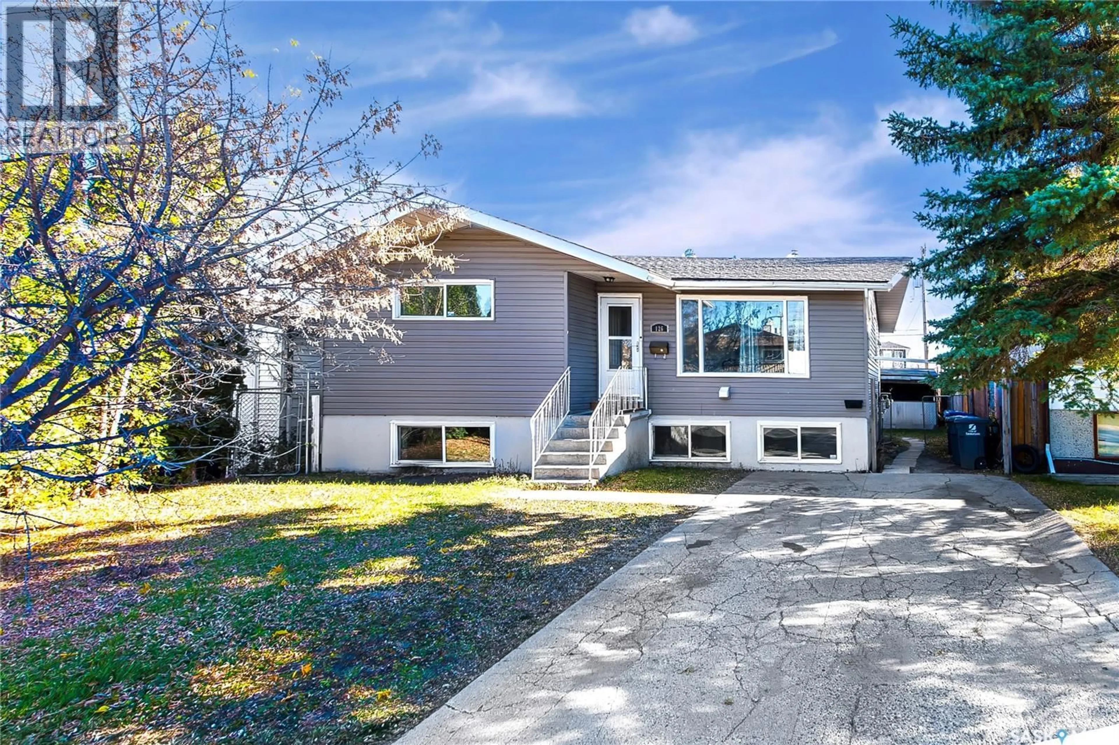 Home with vinyl exterior material, street for 126 Y AVENUE, Saskatoon Saskatchewan S7M3J3
