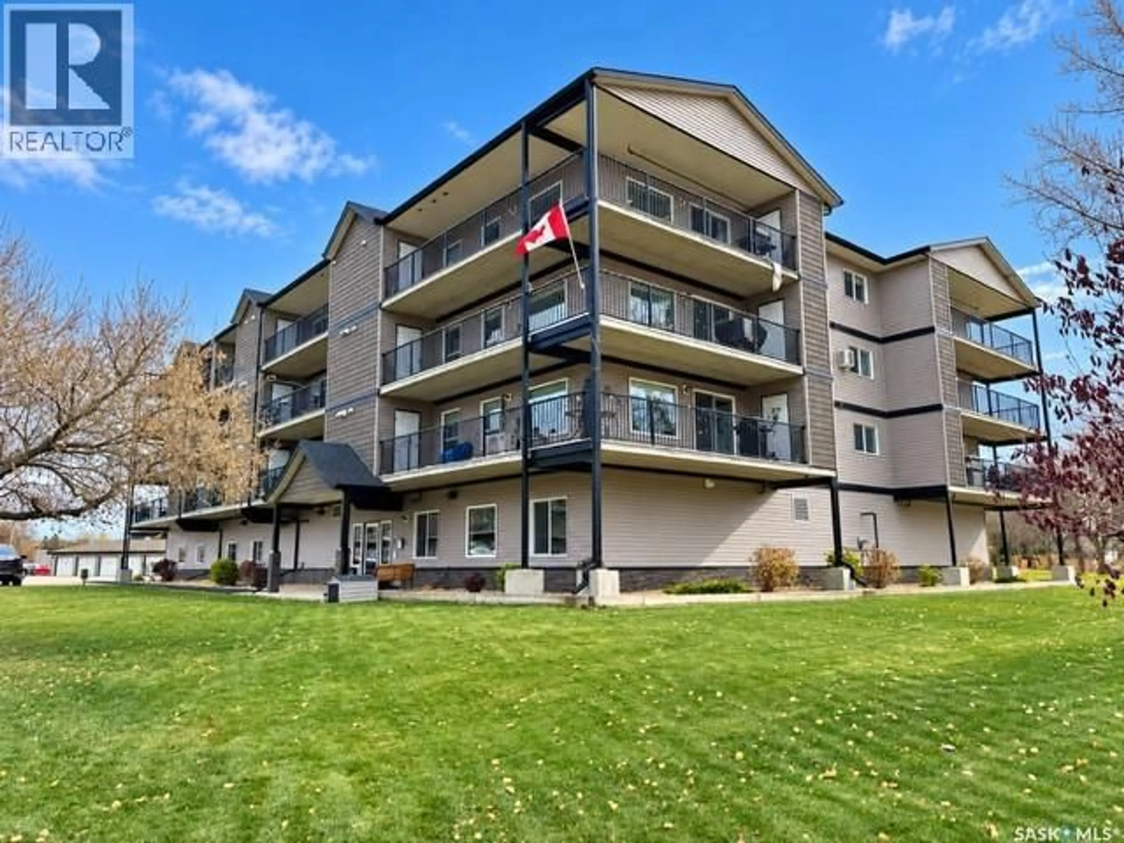 A pic from outside/outdoor area/front of a property/back of a property/a pic from drone, mountain view for 307 1213 9TH STREET, Humboldt Saskatchewan S0K2A0