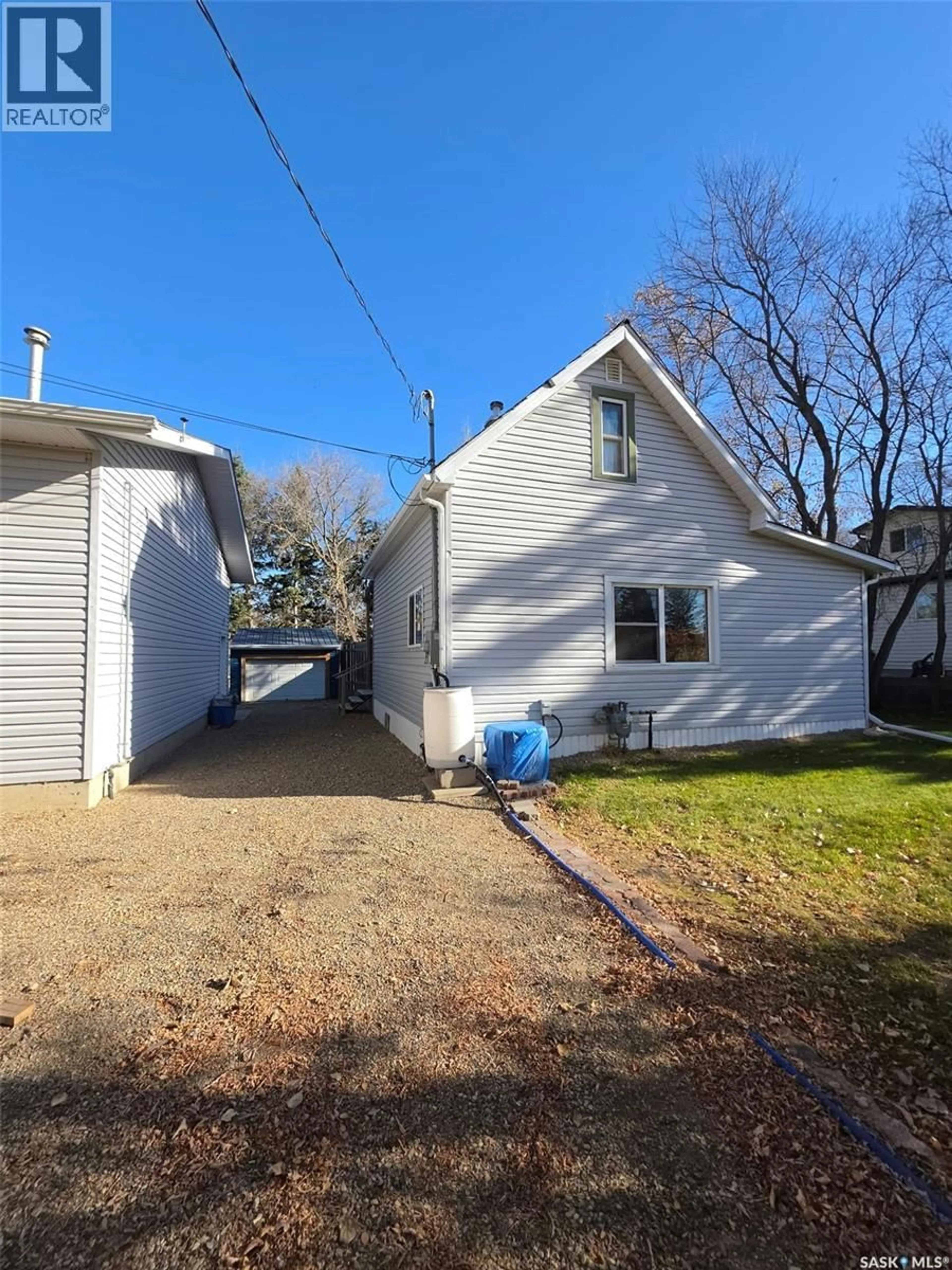 A pic from outside/outdoor area/front of a property/back of a property/a pic from drone, street for 233 ANCONA STREET, Esterhazy Saskatchewan S0A0X0