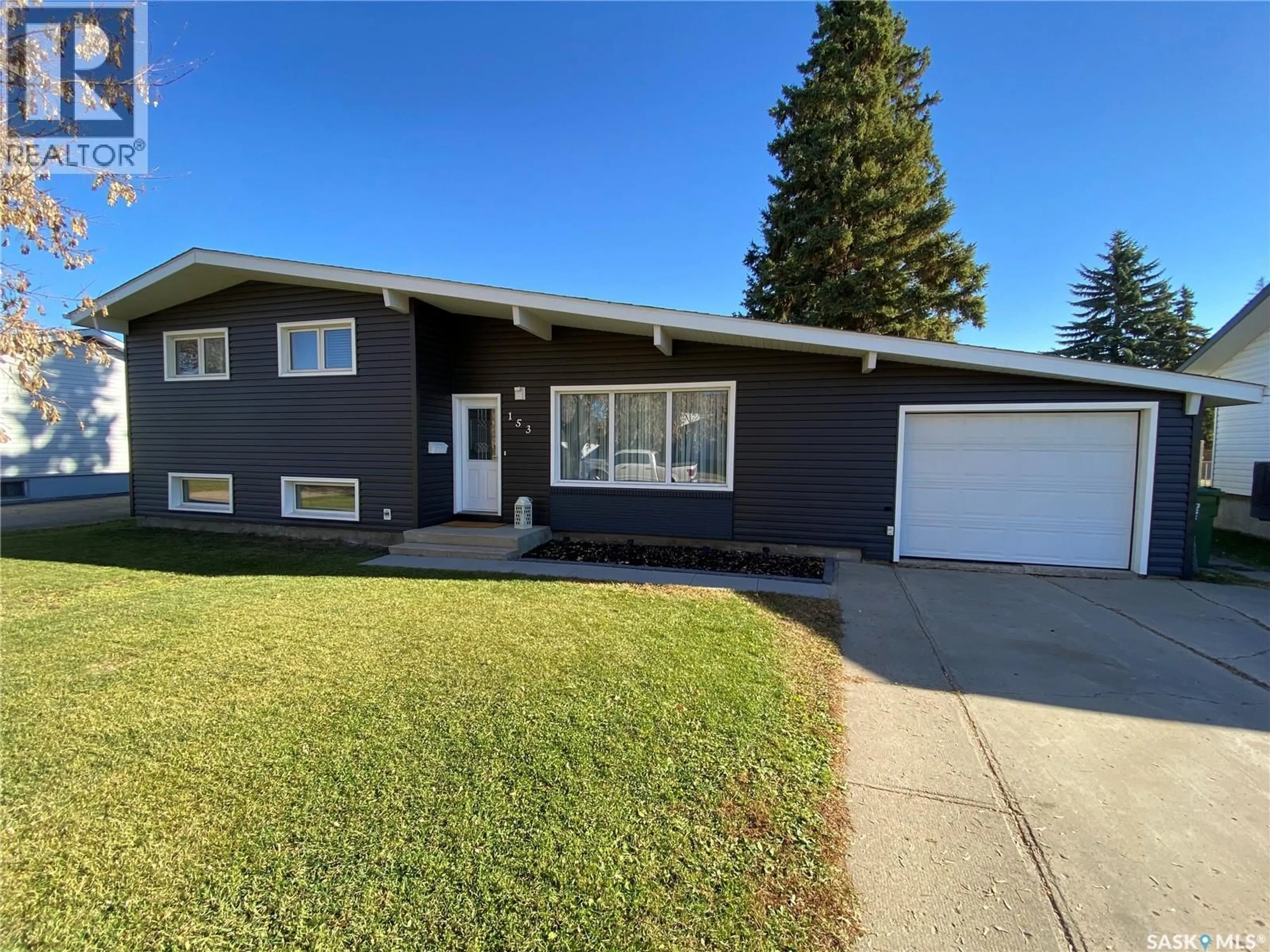 Home with vinyl exterior material, street for 153 DALEBROOKE DRIVE, Yorkton Saskatchewan S3N2N8