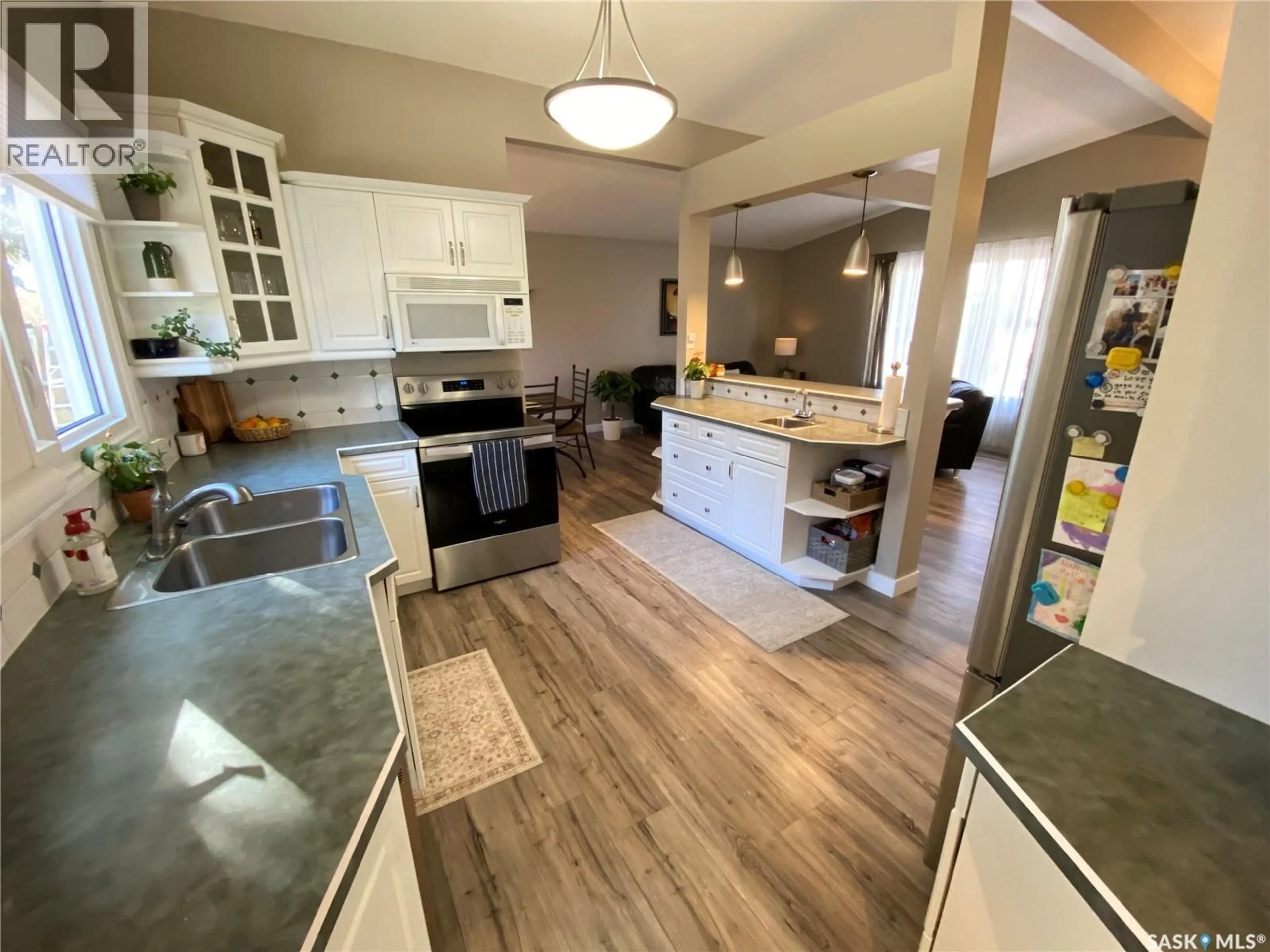 Open concept kitchen, ceramic/tile floor for 153 DALEBROOKE DRIVE, Yorkton Saskatchewan S3N2N8