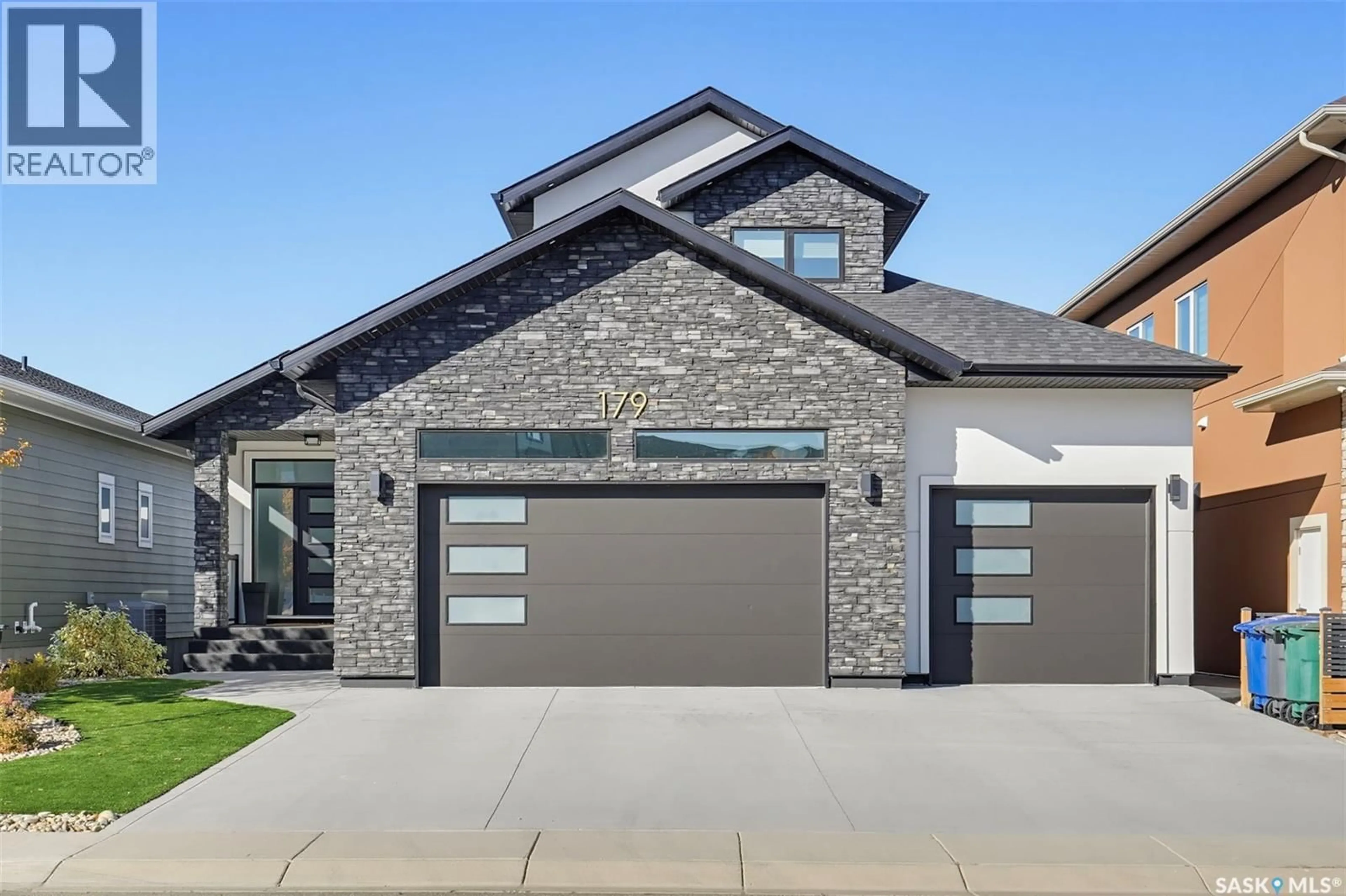 Home with brick exterior material, street for 179 KENASCHUK CRESCENT, Saskatoon Saskatchewan S7W0Y3