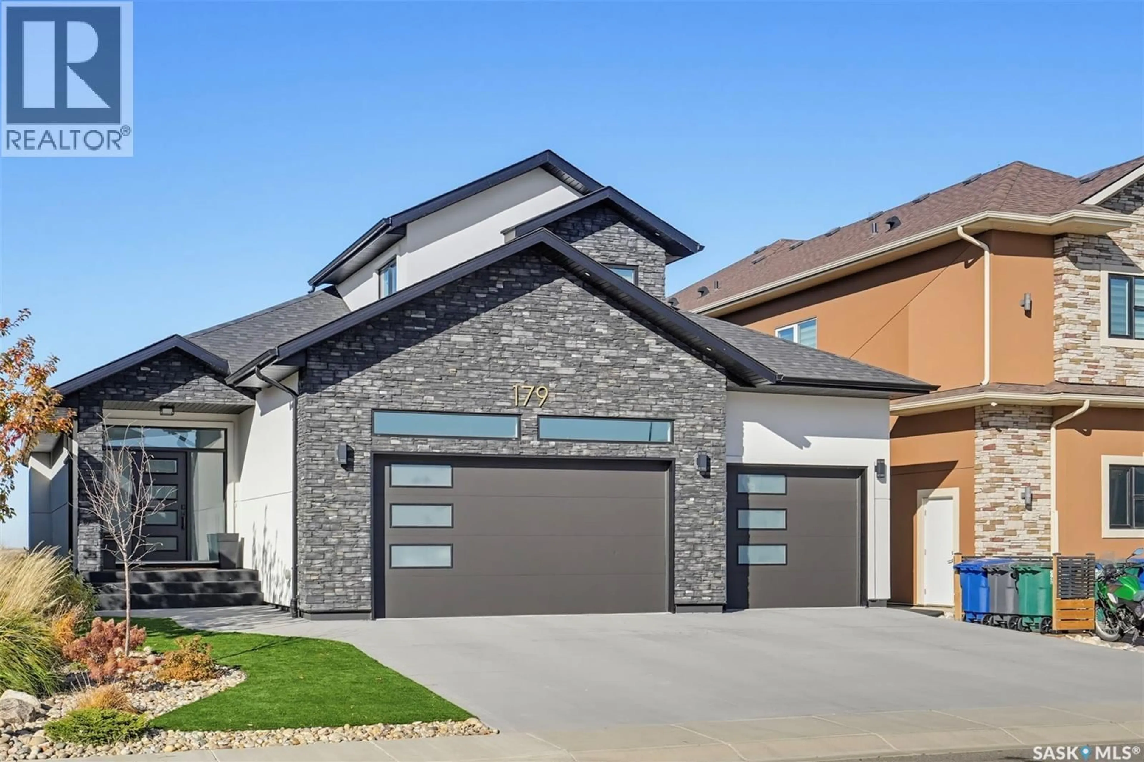 Home with brick exterior material, street for 179 KENASCHUK CRESCENT, Saskatoon Saskatchewan S7W0Y3