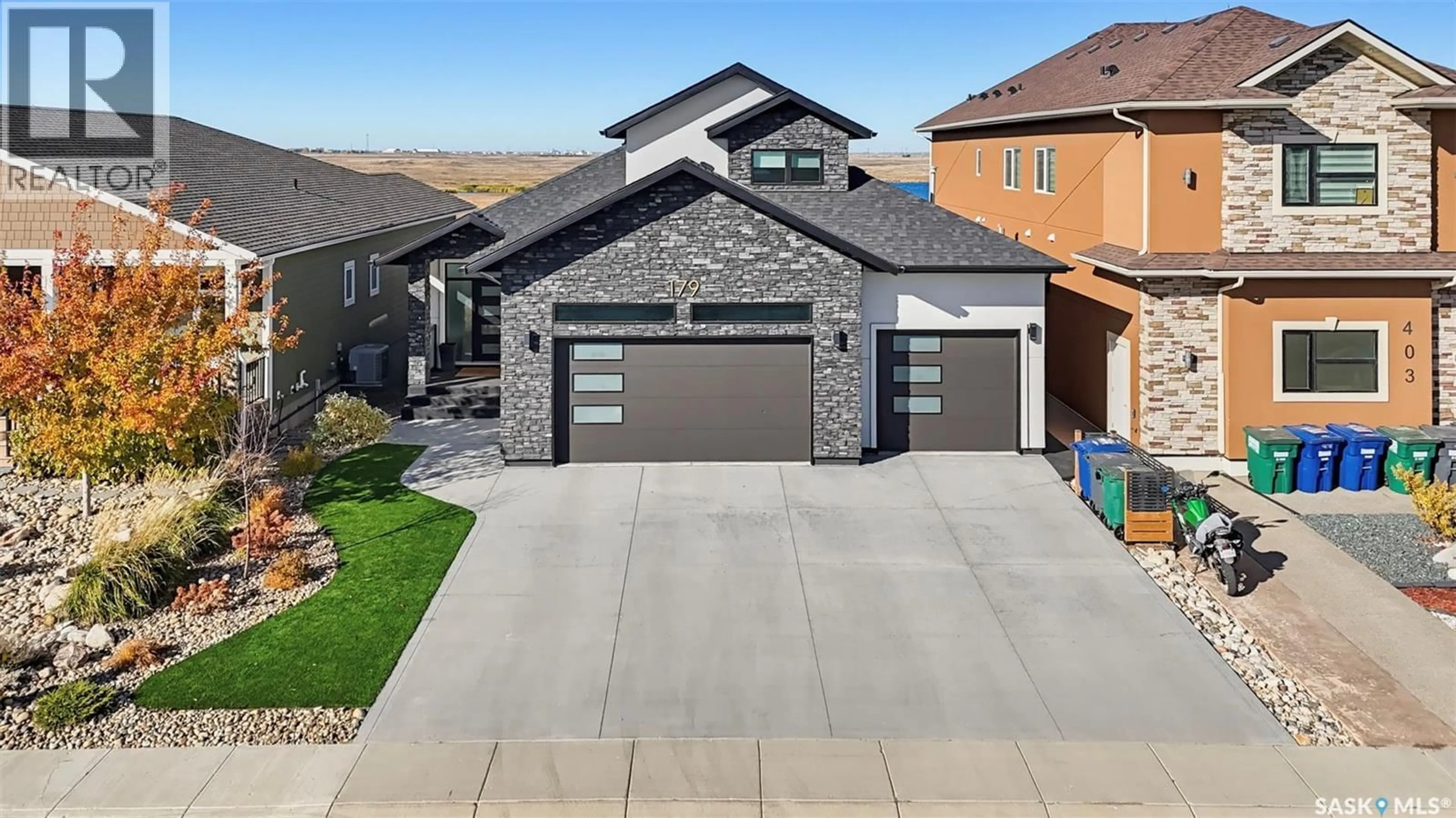 Home with brick exterior material, street for 179 KENASCHUK CRESCENT, Saskatoon Saskatchewan S7W0Y3