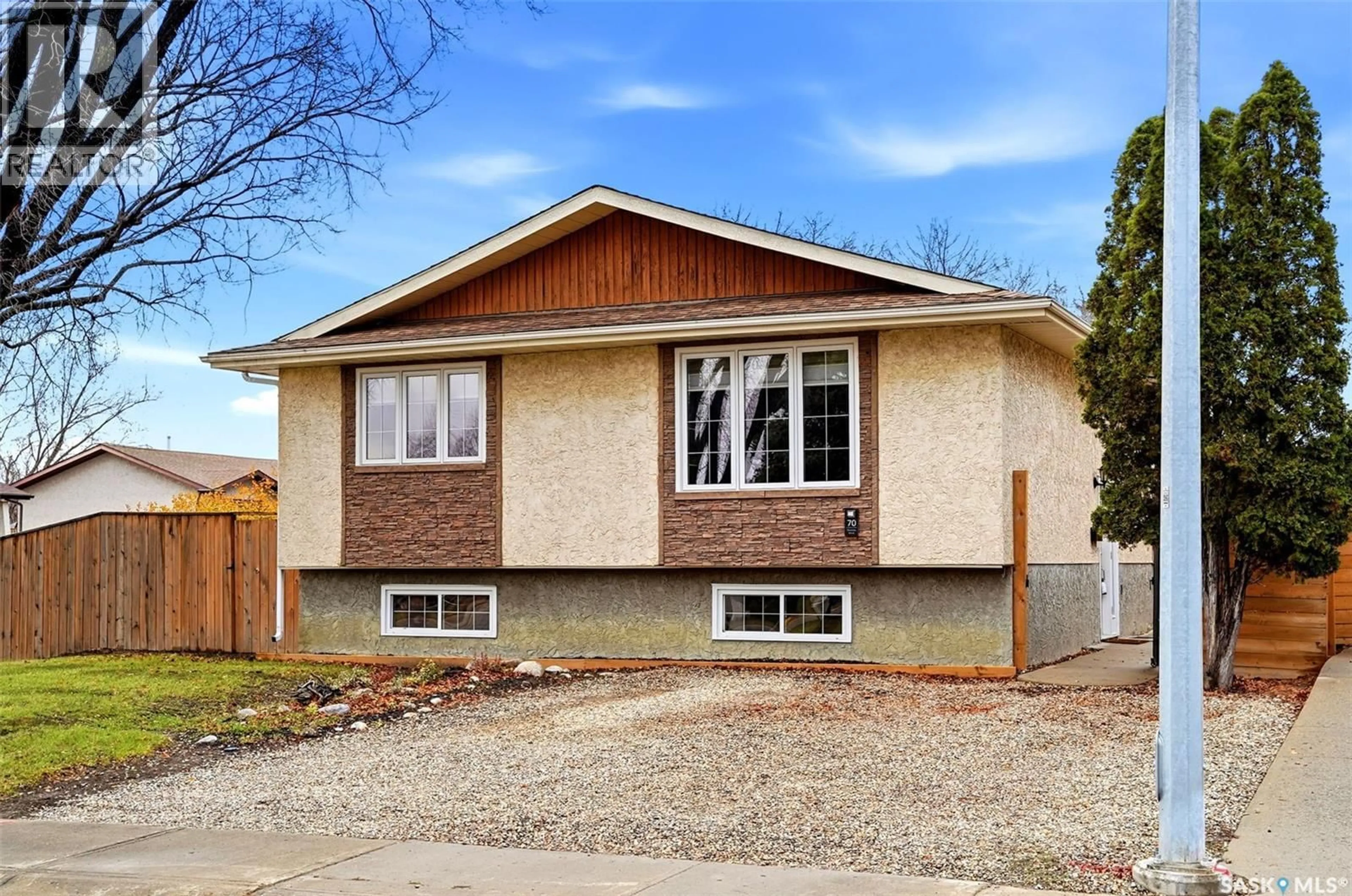 Home with vinyl exterior material, street for 70 SHERMAN ROAD, Regina Saskatchewan S4X2R8