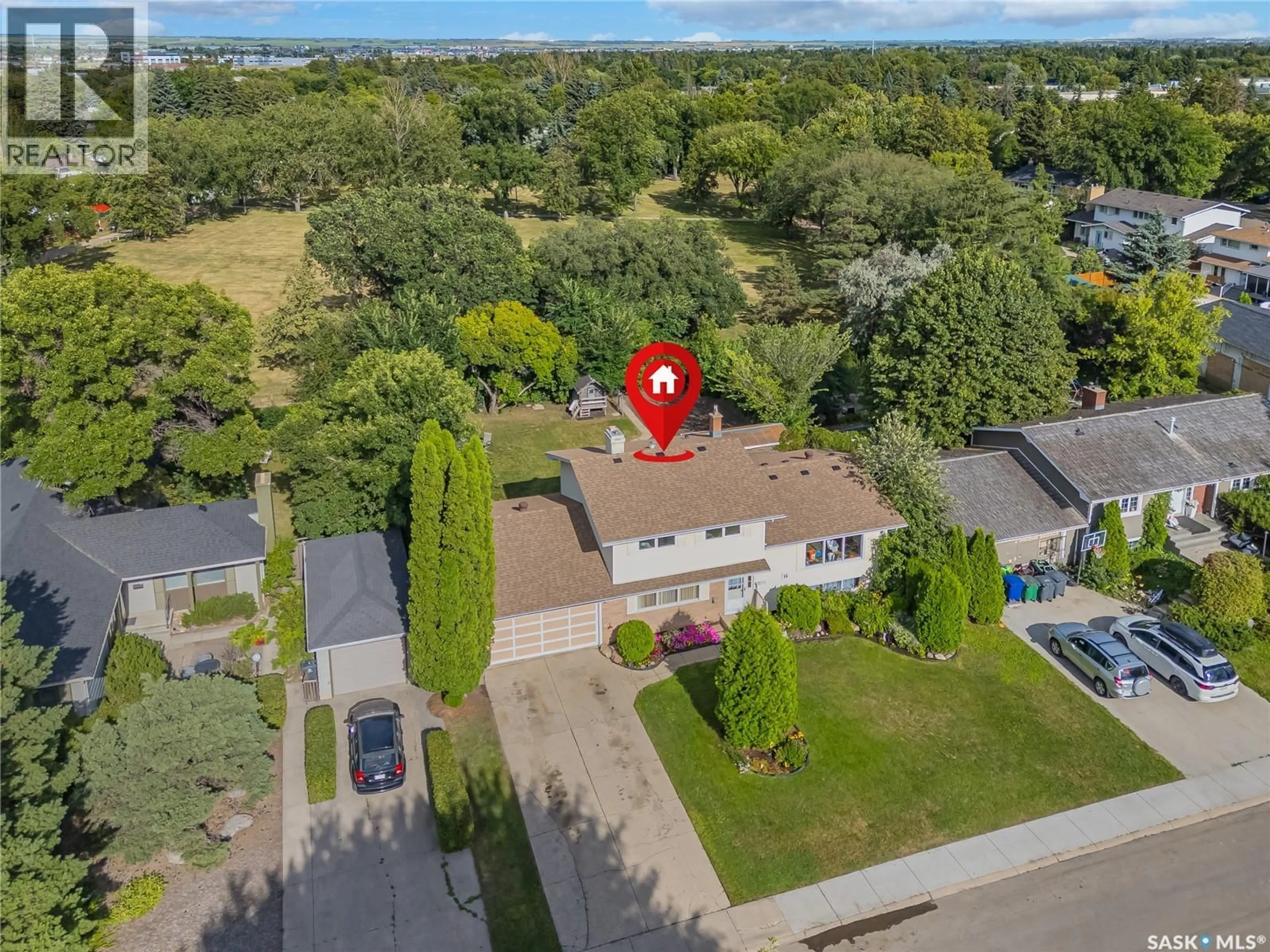 A pic from outside/outdoor area/front of a property/back of a property/a pic from drone, street for 15 HARVARD CRESCENT, Saskatoon Saskatchewan S7H3R2