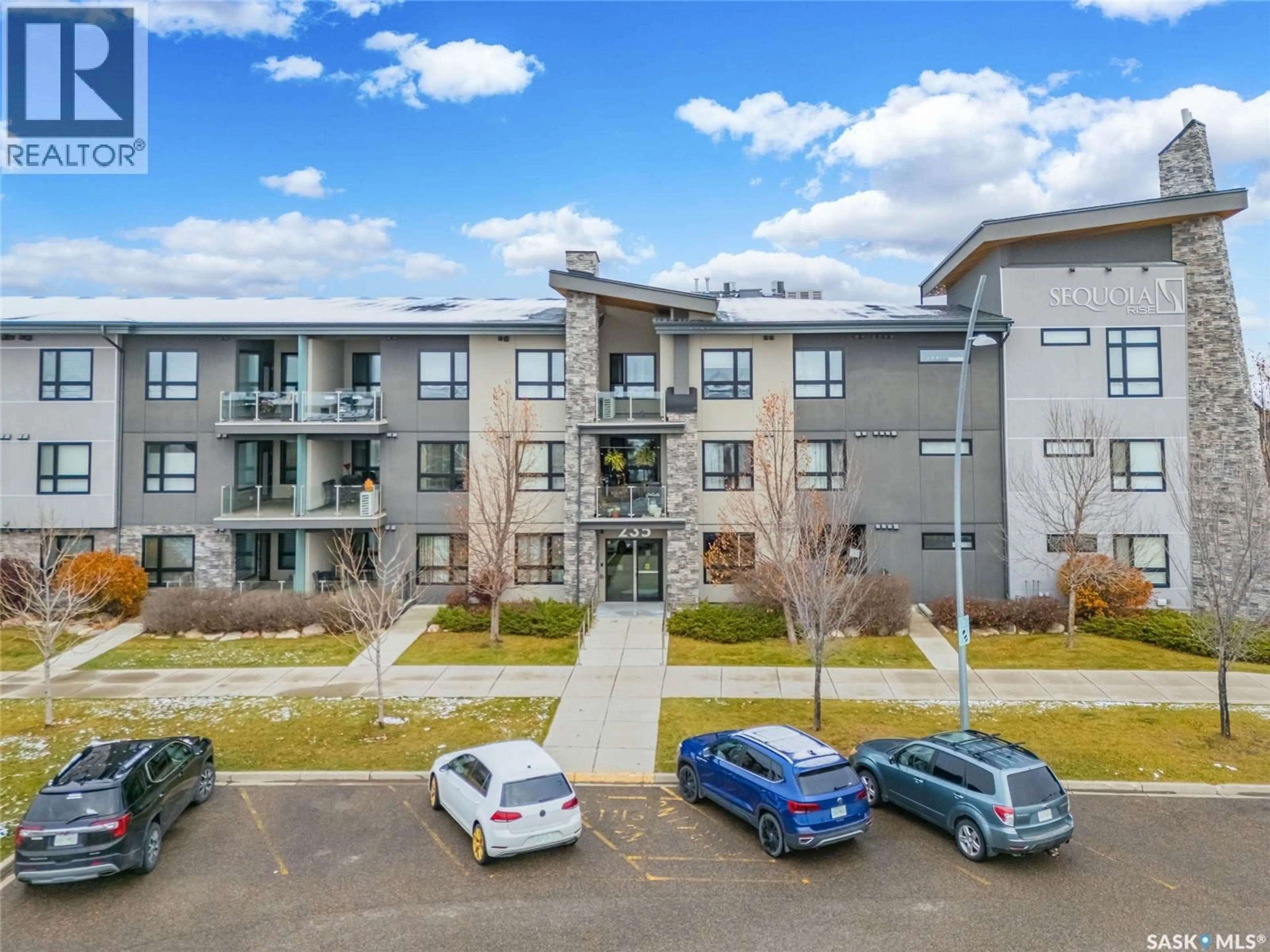 A pic from outside/outdoor area/front of a property/back of a property/a pic from drone, unknown for 122 235 EVERGREEN SQUARE, Saskatoon Saskatchewan S7W0P9