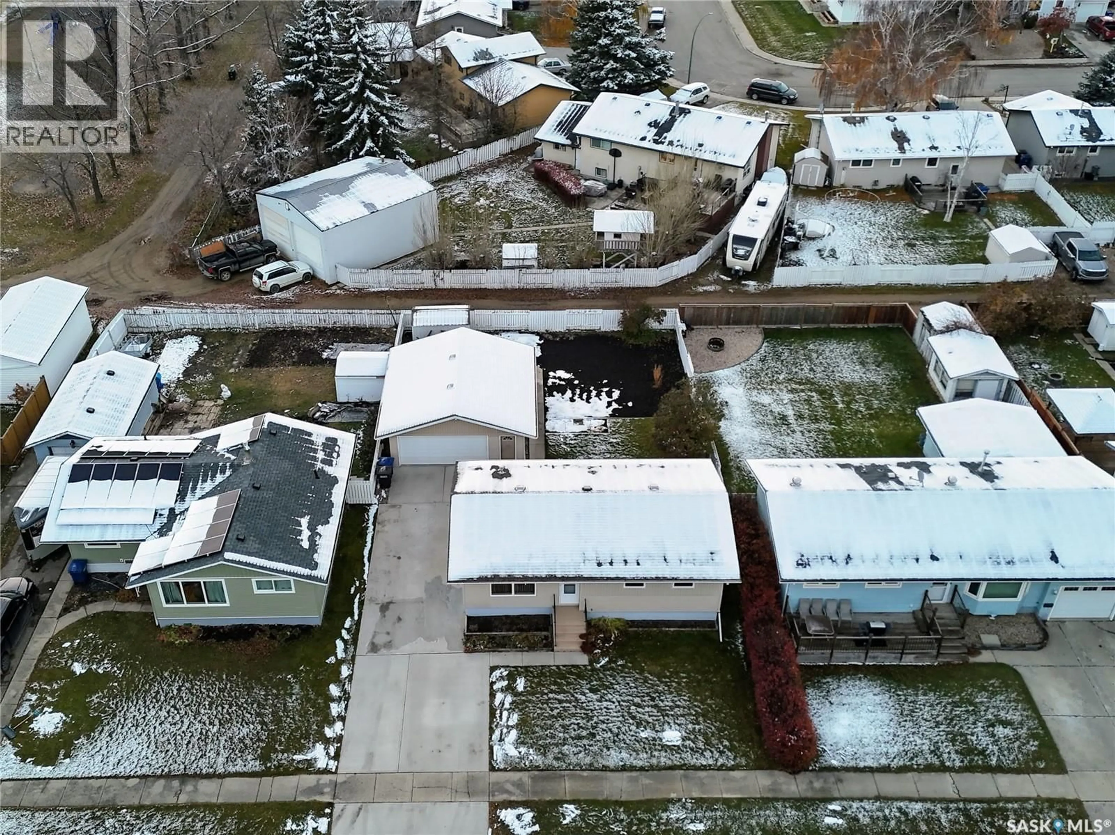 A pic from outside/outdoor area/front of a property/back of a property/a pic from drone, street for 1005 14TH STREET, Humboldt Saskatchewan S0K2A0