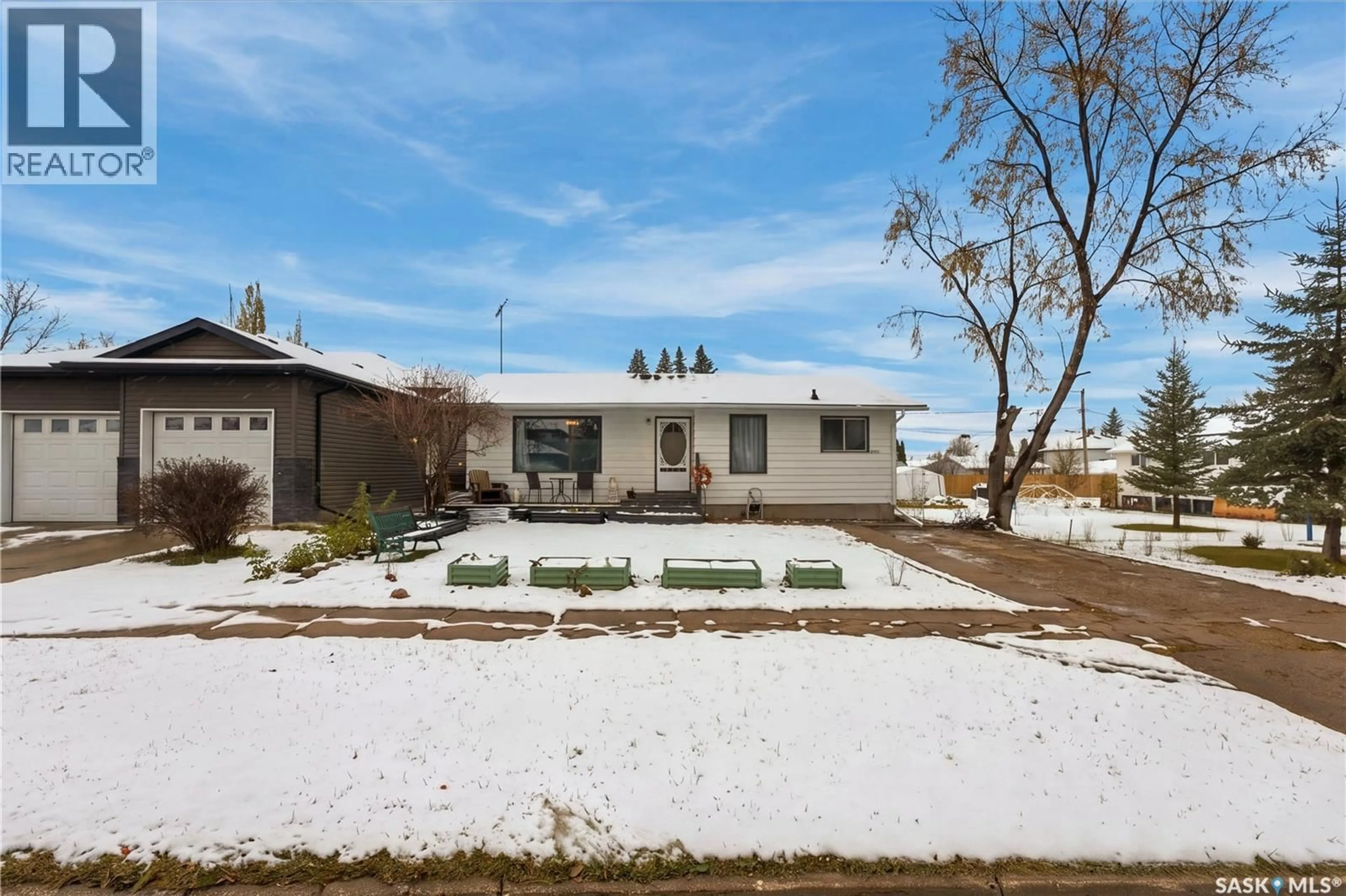 A pic from outside/outdoor area/front of a property/back of a property/a pic from drone, street for 2011 9TH STREET, Rosthern Saskatchewan S0K3R0