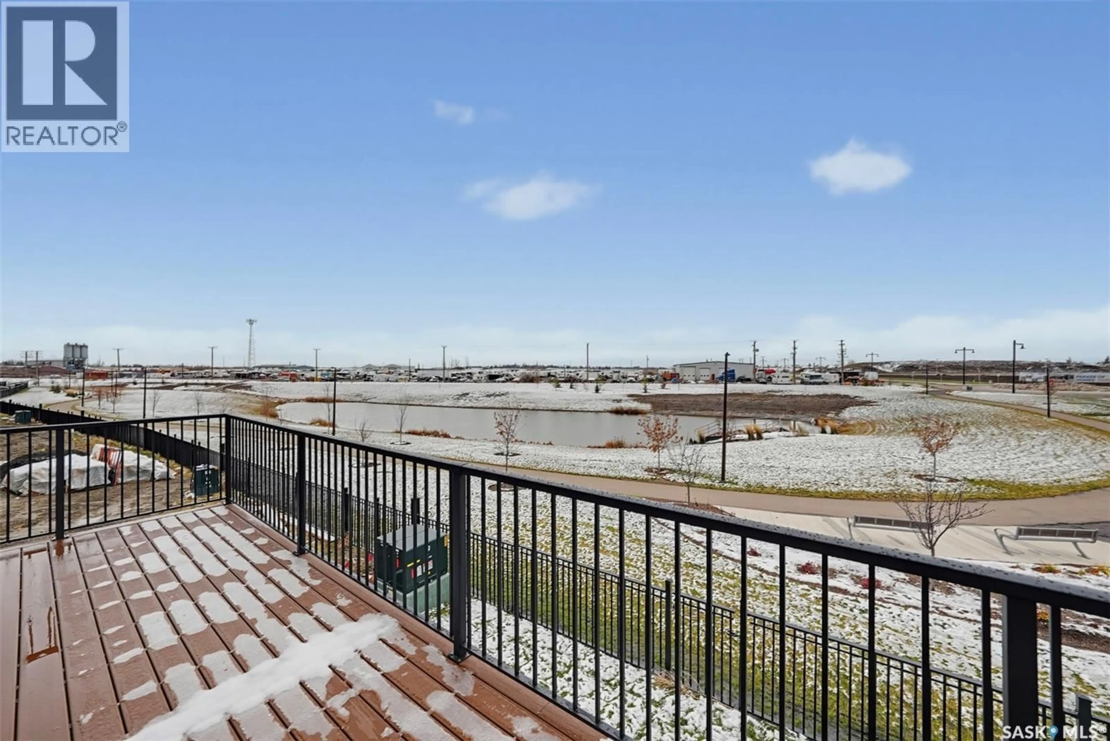 Patio, water/lake/river/ocean view for 103 NAZARALI WAY, Saskatoon Saskatchewan S7V1X8