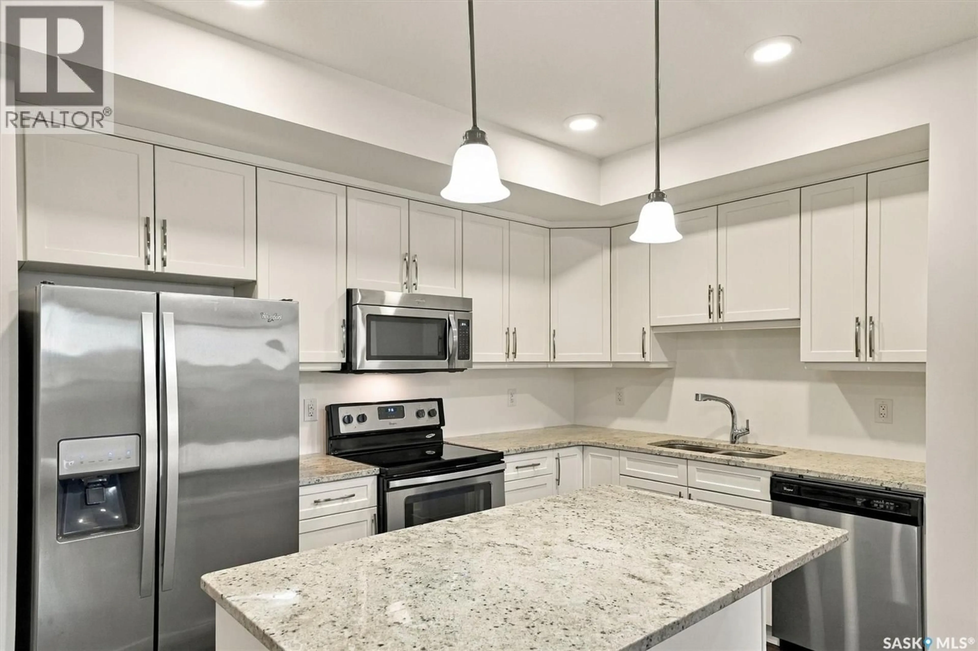 Open concept kitchen, ceramic/tile floor for 770 - 309 CHILDERS CRESCENT, Saskatoon Saskatchewan S7L6W1