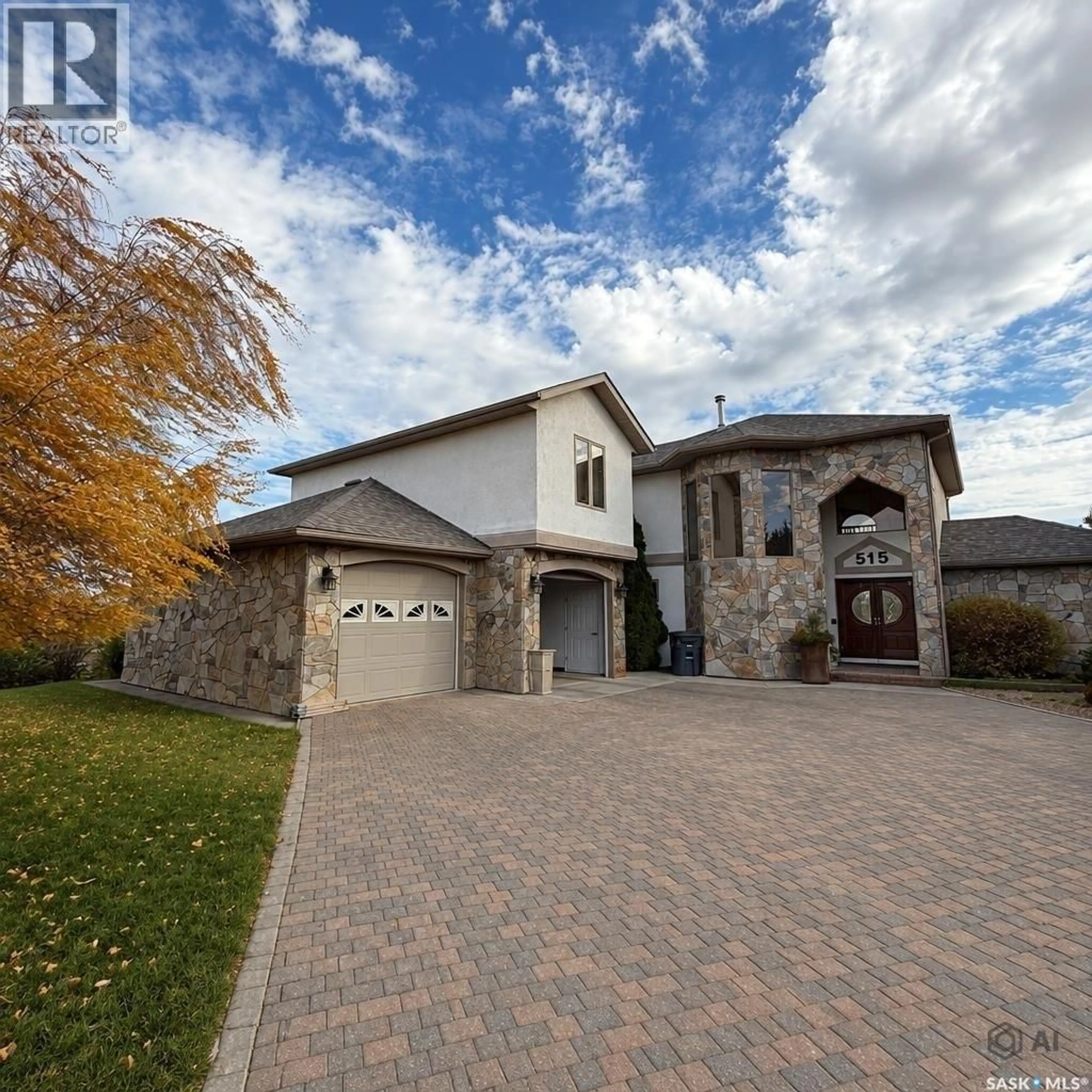 Home with brick exterior material, street for 515 ASPEN DRIVE, Swift Current Saskatchewan S9H5E3
