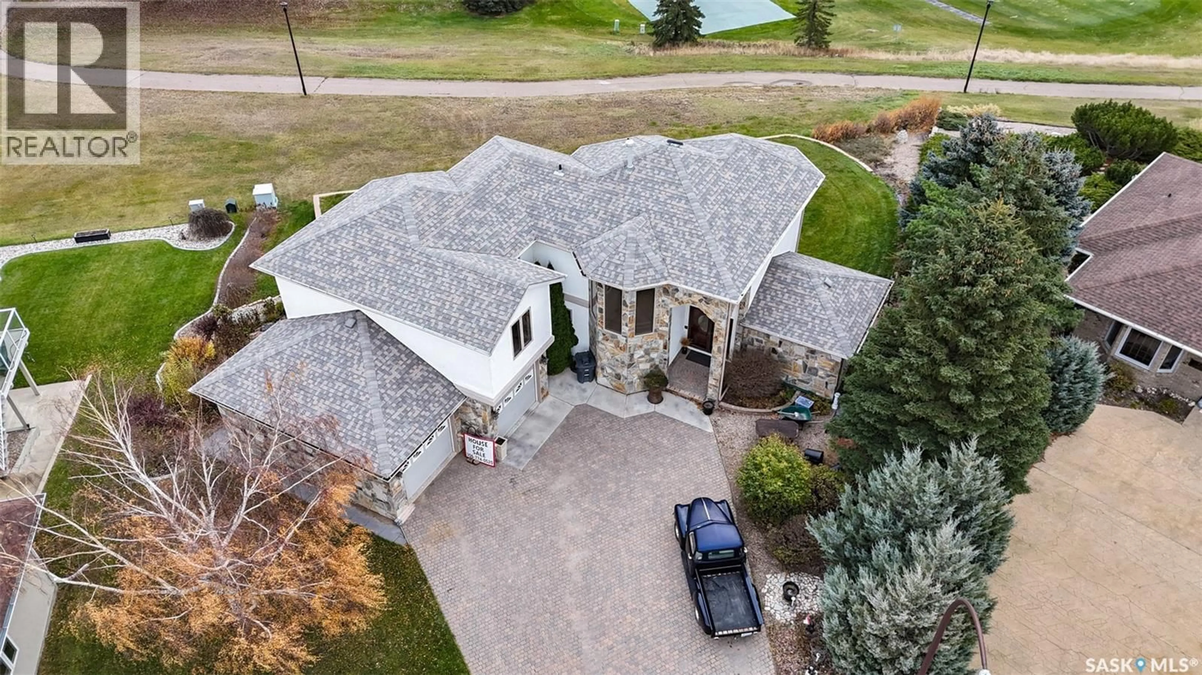 A pic from outside/outdoor area/front of a property/back of a property/a pic from drone, street for 515 ASPEN DRIVE, Swift Current Saskatchewan S9H5E3