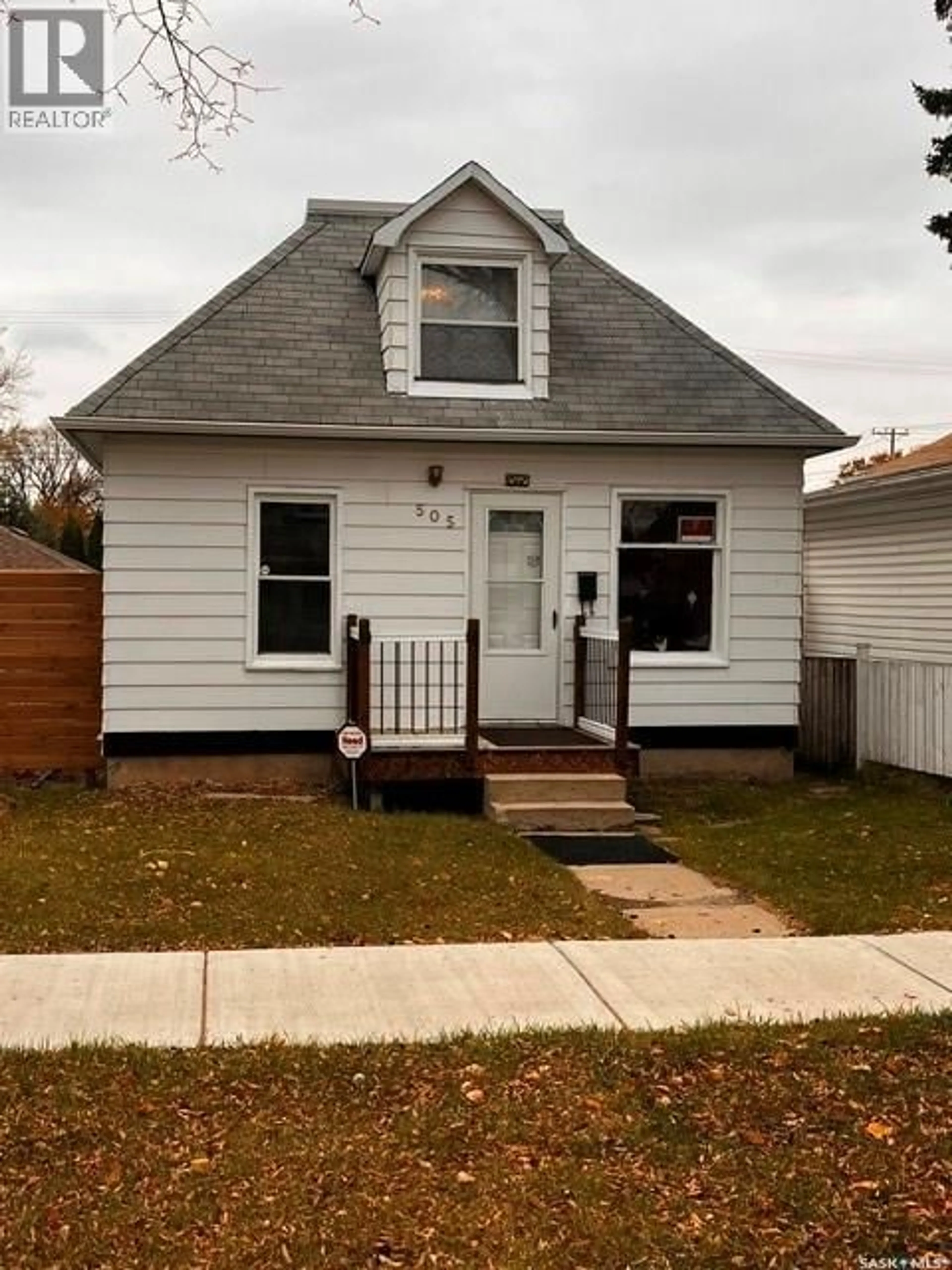 Home with vinyl exterior material, street for 505 I AVENUE, Saskatoon Saskatchewan S7M1Y6