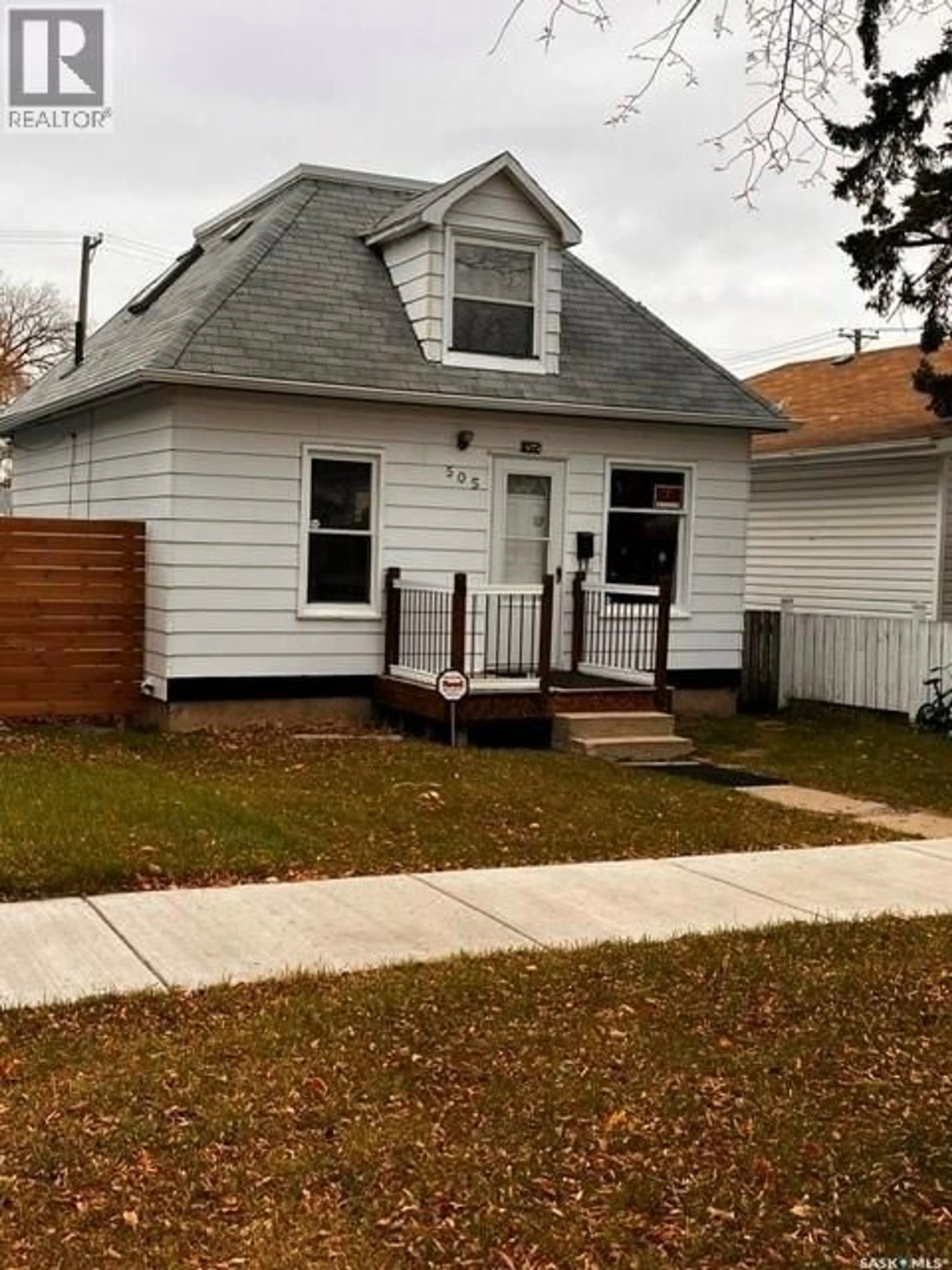 Home with vinyl exterior material, street for 505 I AVENUE, Saskatoon Saskatchewan S7M1Y6