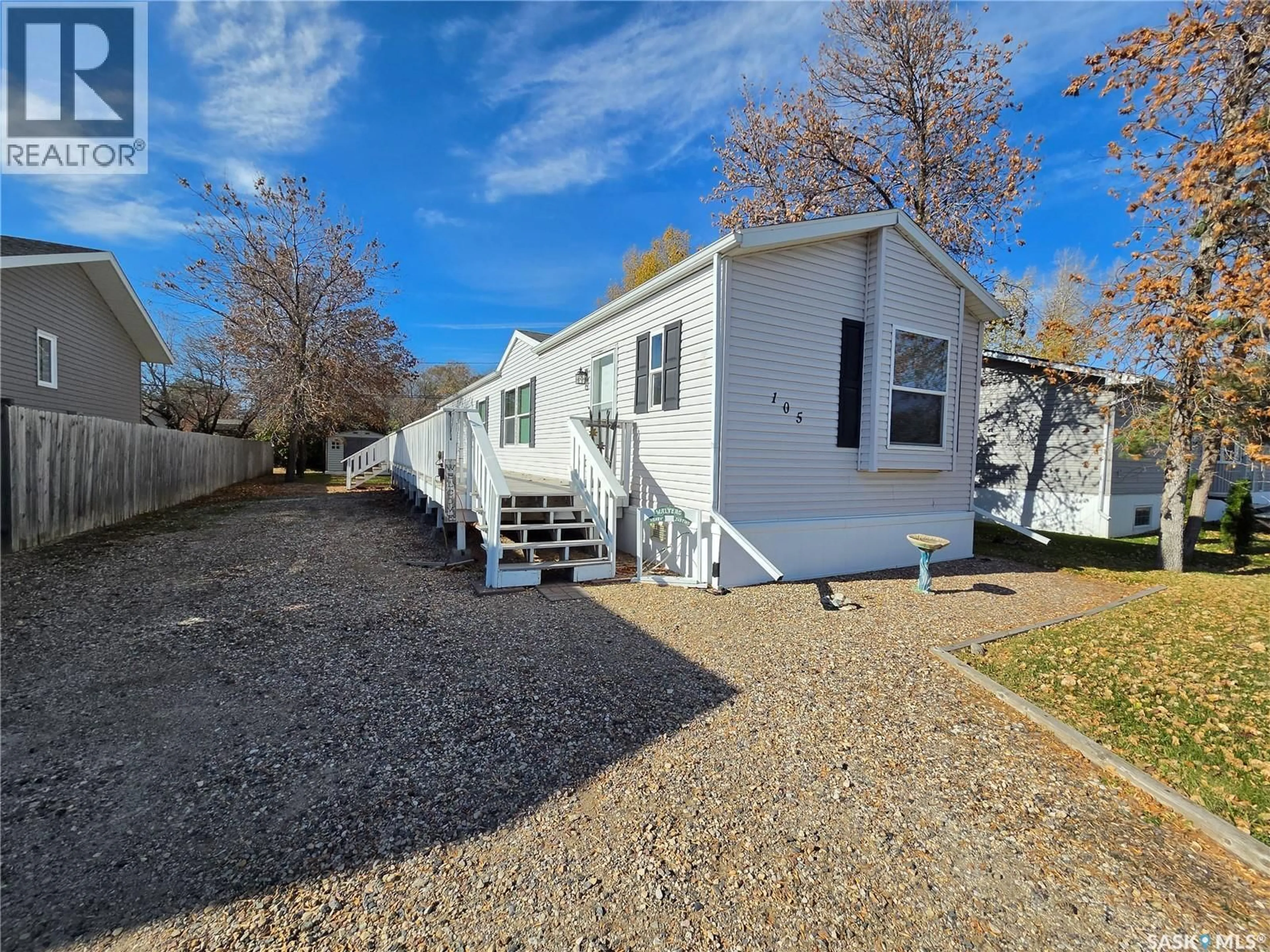 A pic from outside/outdoor area/front of a property/back of a property/a pic from drone, water/lake/river/ocean view for 105 GROVE STREET, Lampman Saskatchewan S0C1N0