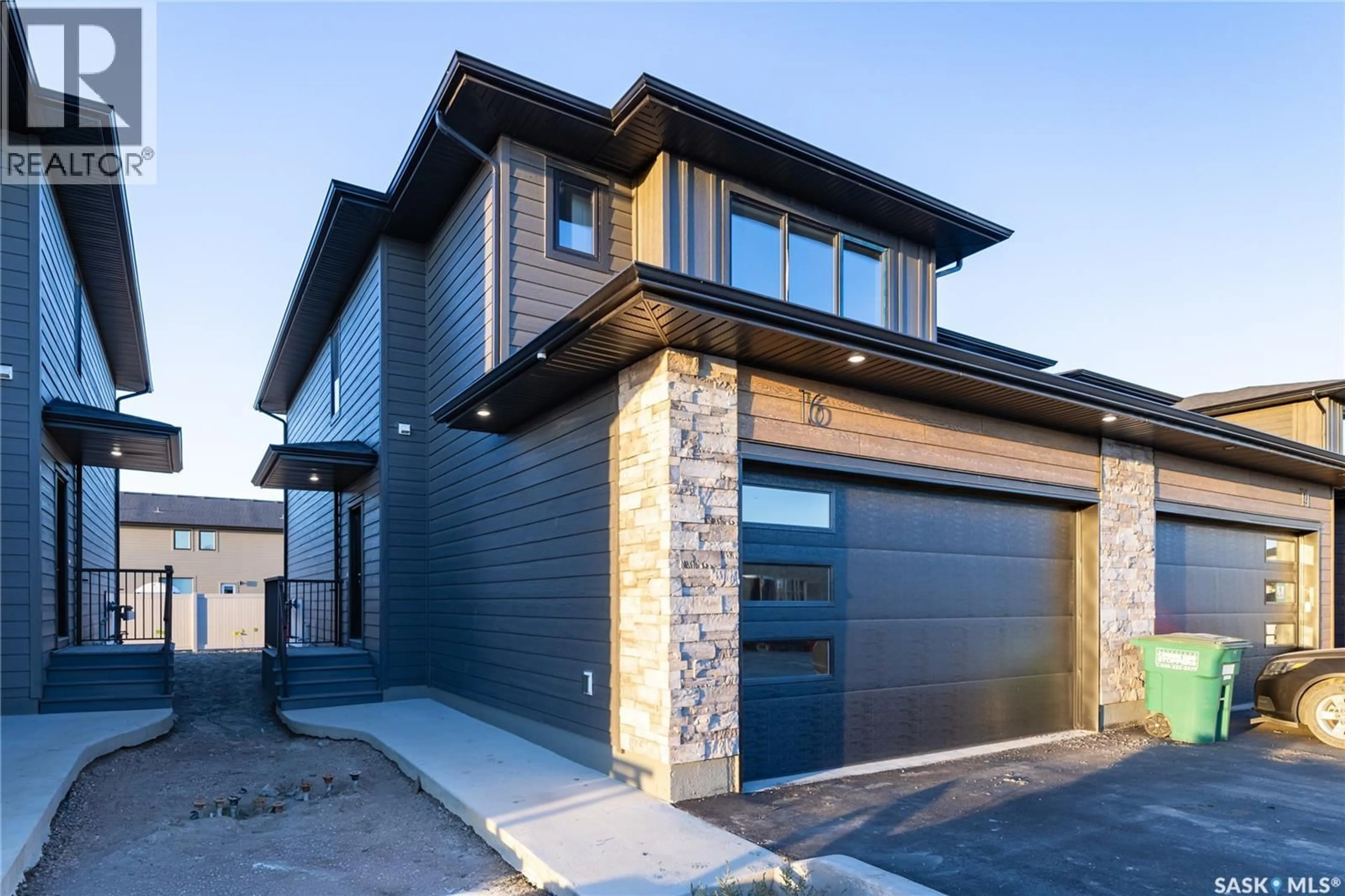 Home with brick exterior material, street for 16 830 BRIGHTON BOULEVARD, Saskatoon Saskatchewan S7V2A8