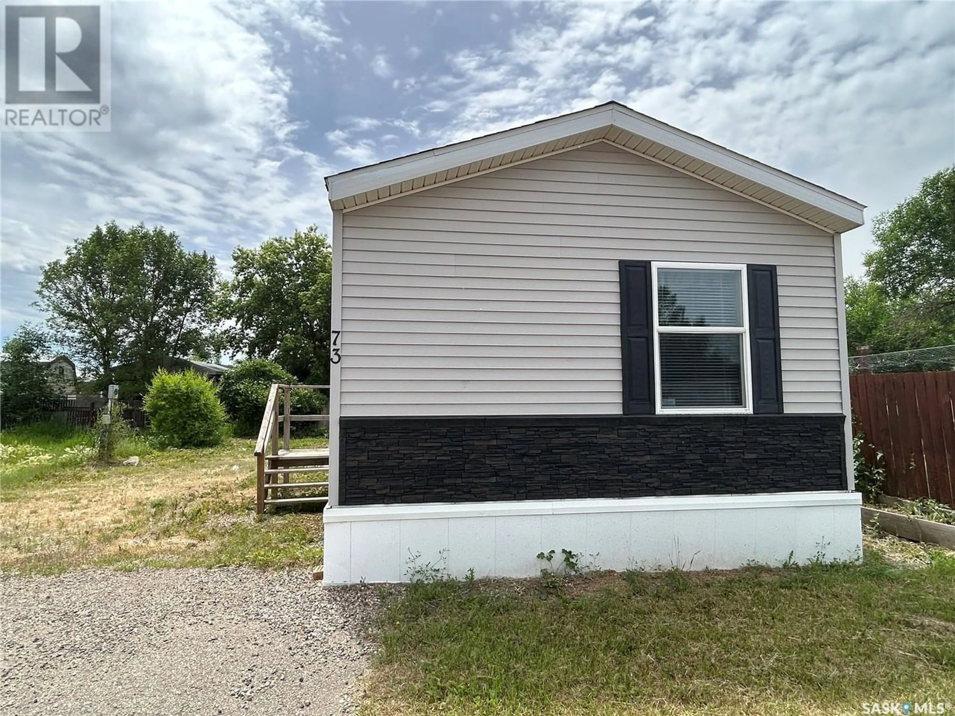 Home with vinyl exterior material for 73 Willow Park GREENS, Estevan Saskatchewan S4A2R5
