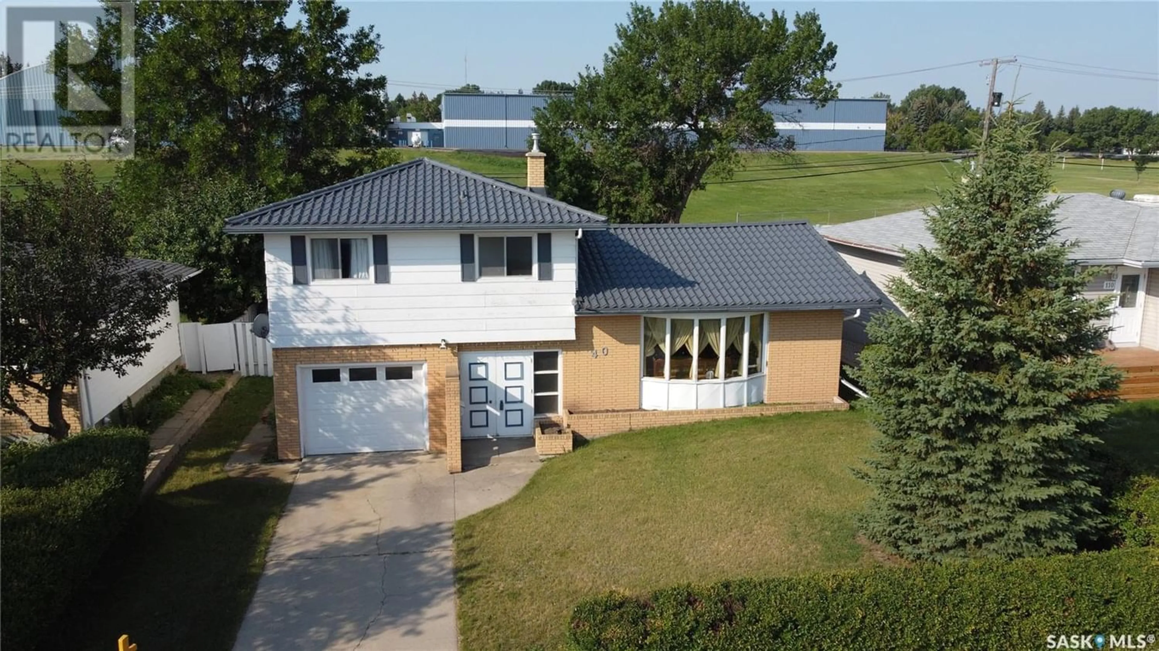 Frontside or backside of a home for 40 Conlin DRIVE SW, Swift Current Saskatchewan S9H3A6