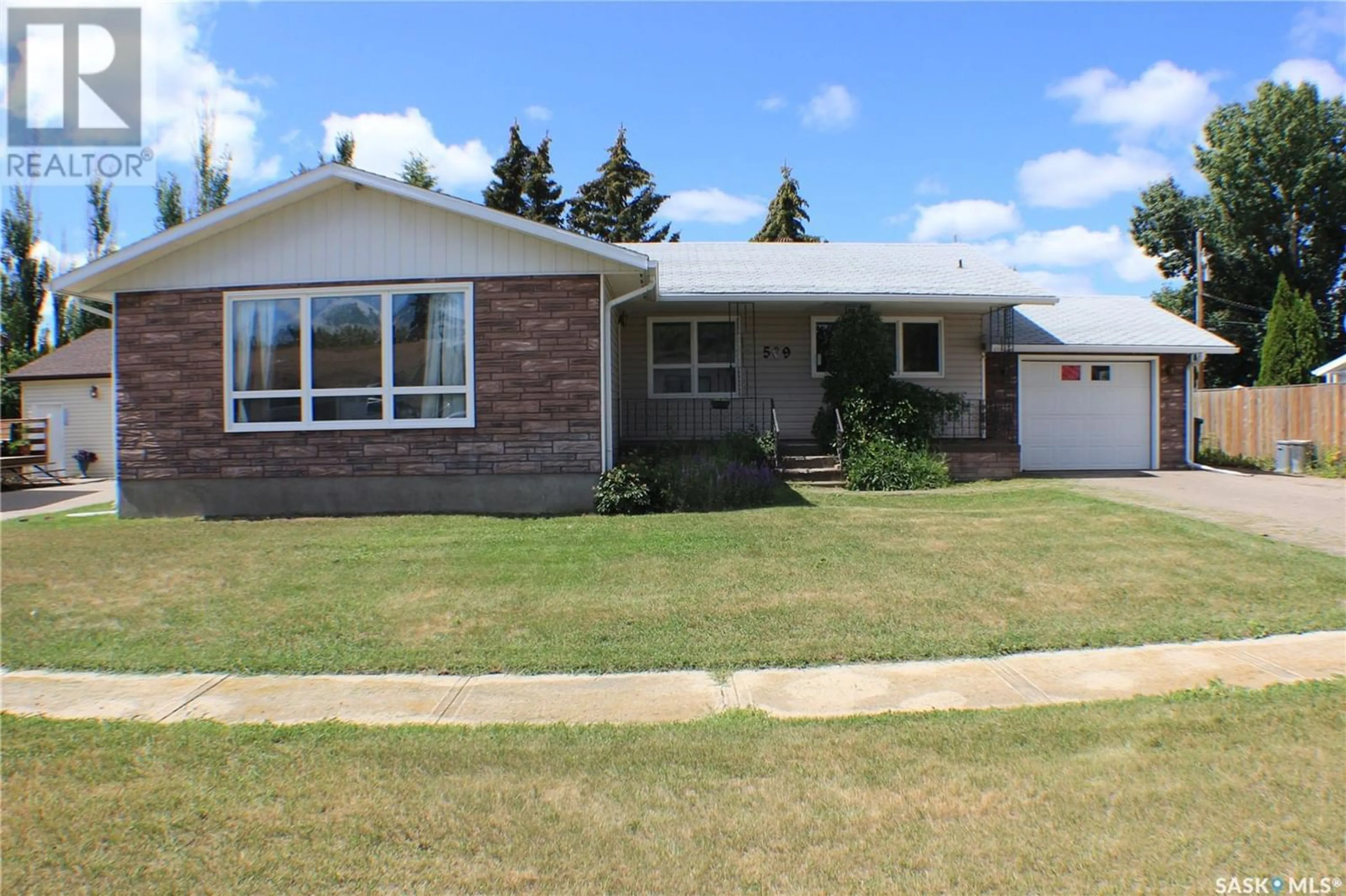 Frontside or backside of a home for 509 4th STREET W, Wilkie Saskatchewan S0K4W0