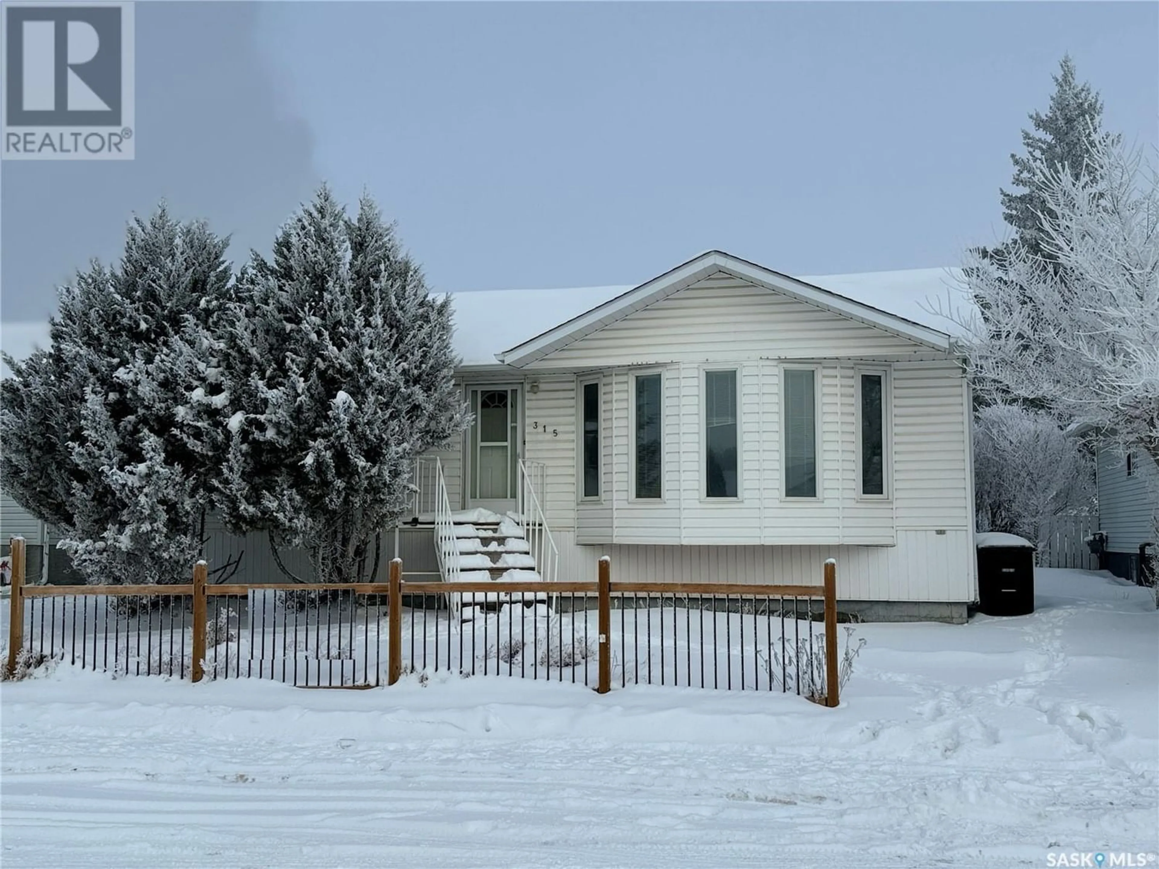 Frontside or backside of a home for 315 6th AVENUE E, Biggar Saskatchewan S0K0M0