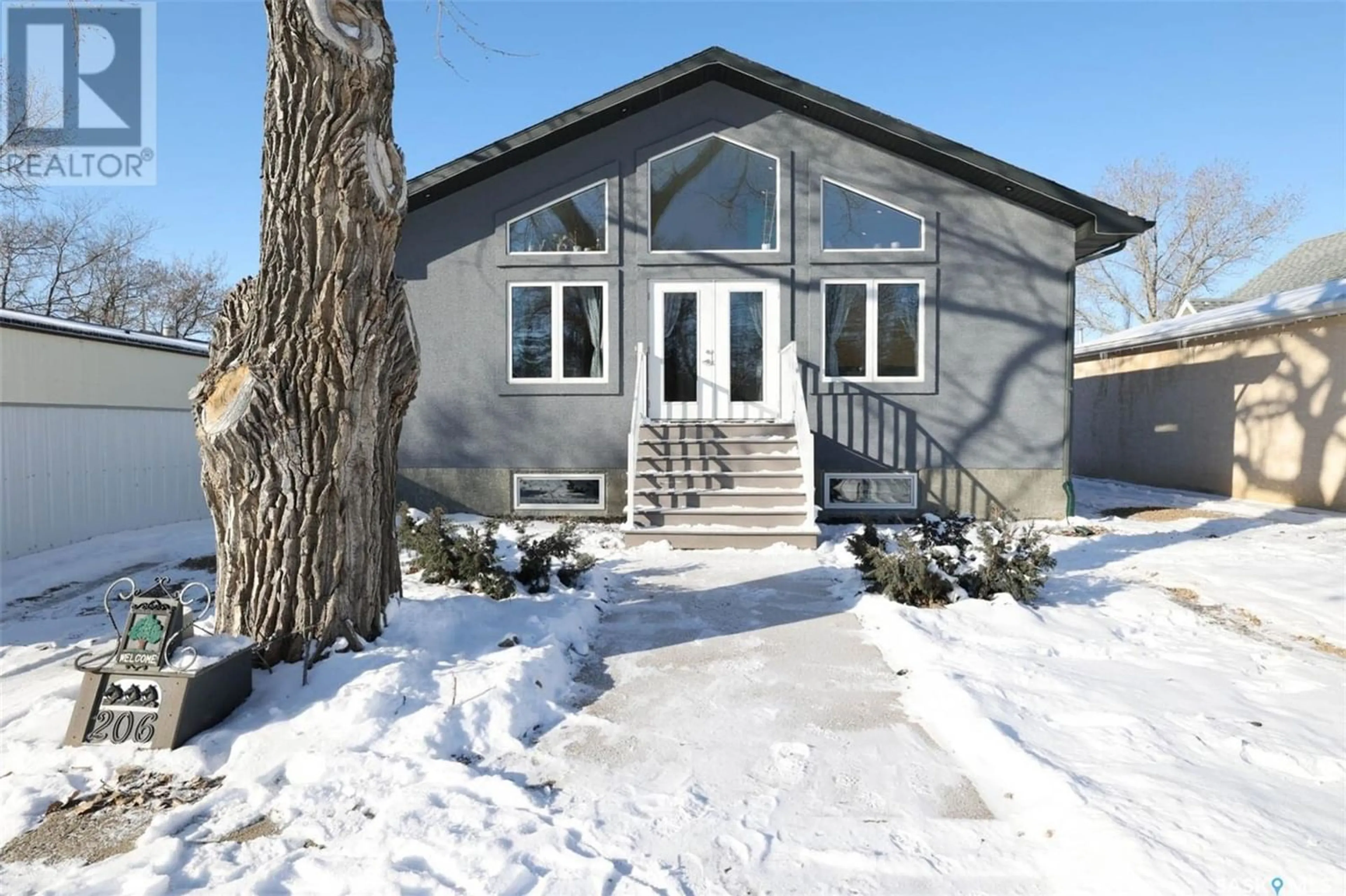 Home with vinyl exterior material for 206 Brunswick STREET, Pense Saskatchewan S0G3W0