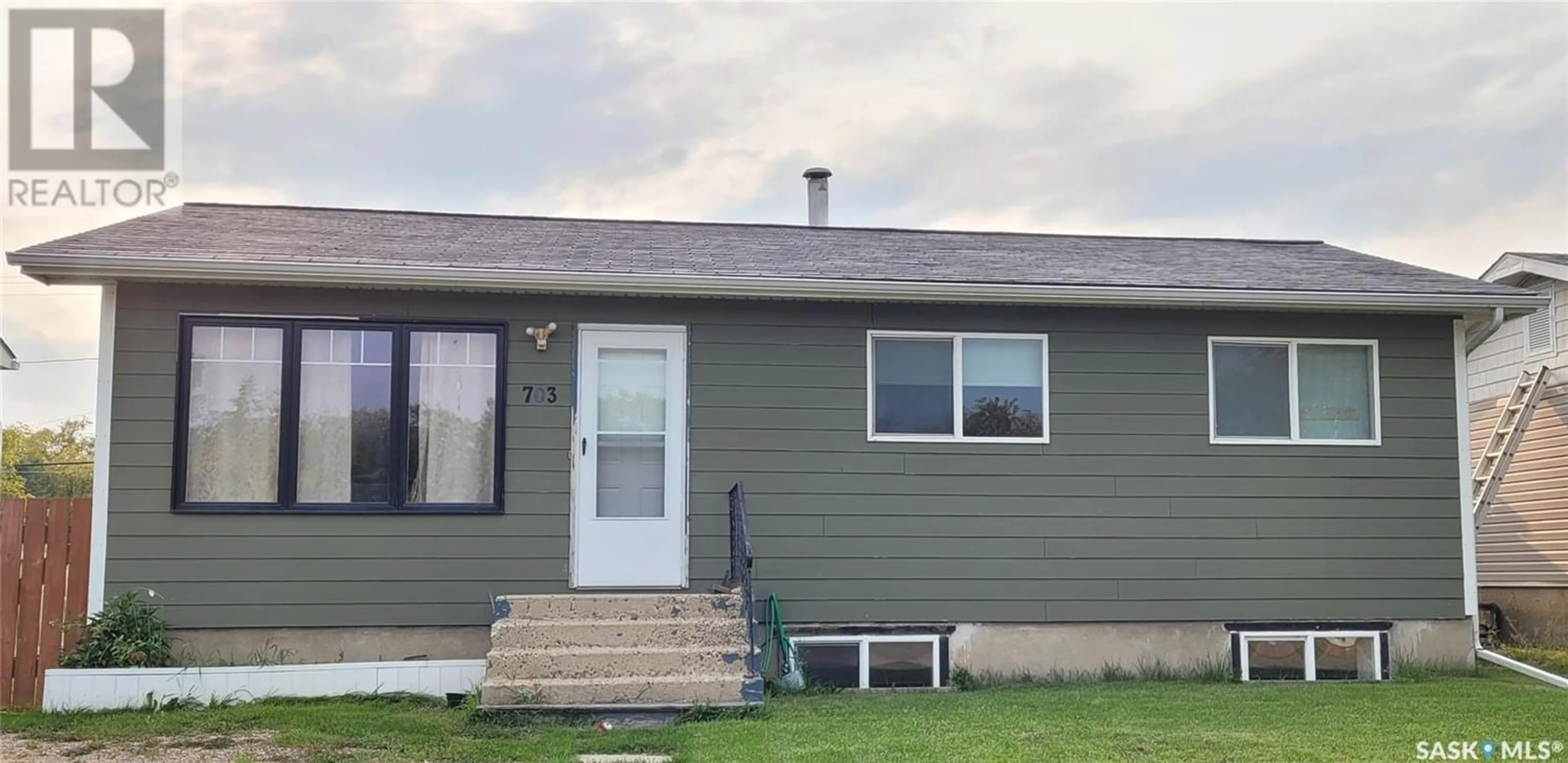 Frontside or backside of a home for 703 3rd STREET E, Meadow Lake Saskatchewan S9X1H6