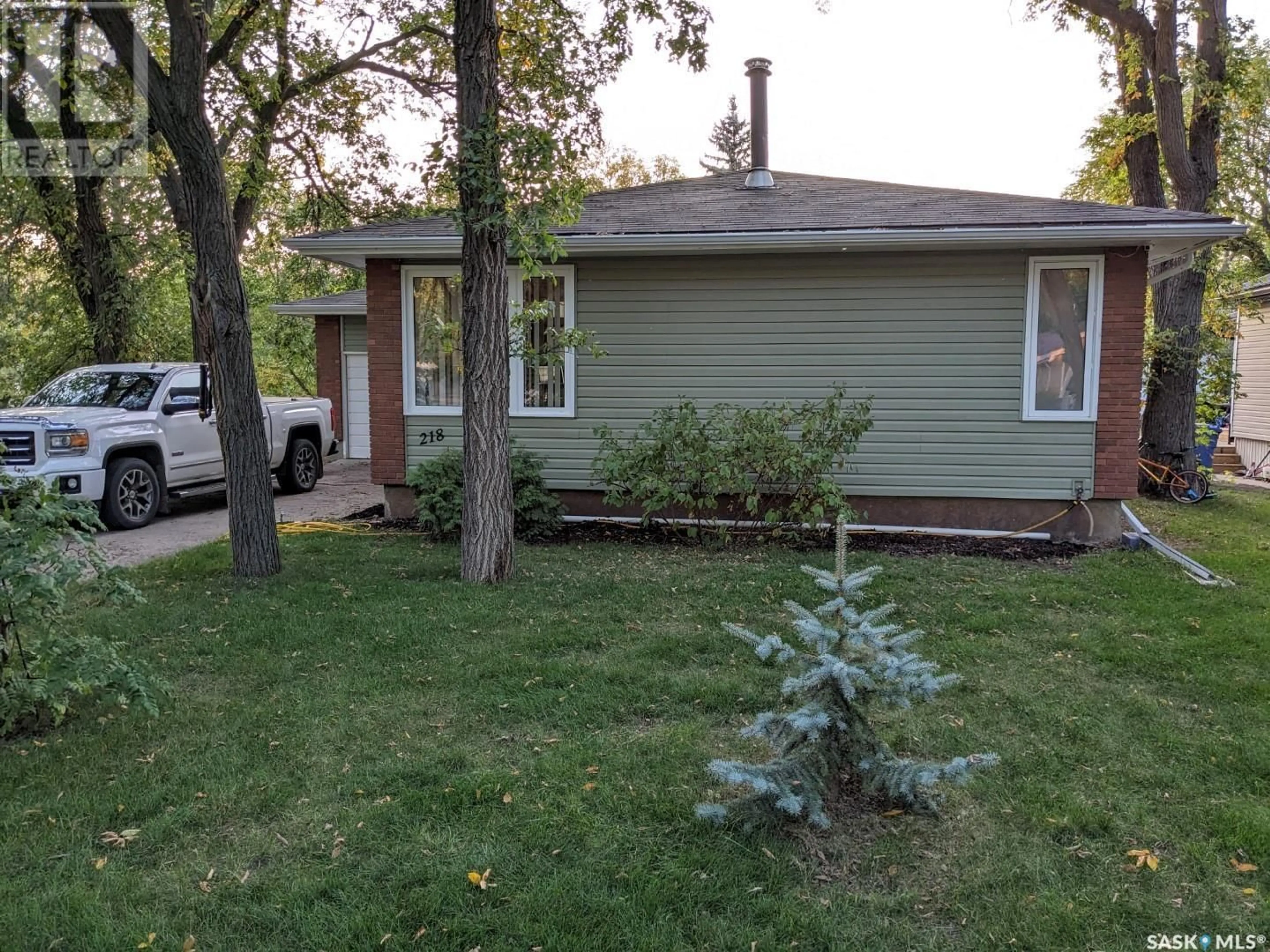 Frontside or backside of a home for 218 2nd STREET W, Carlyle Saskatchewan S0C0R0