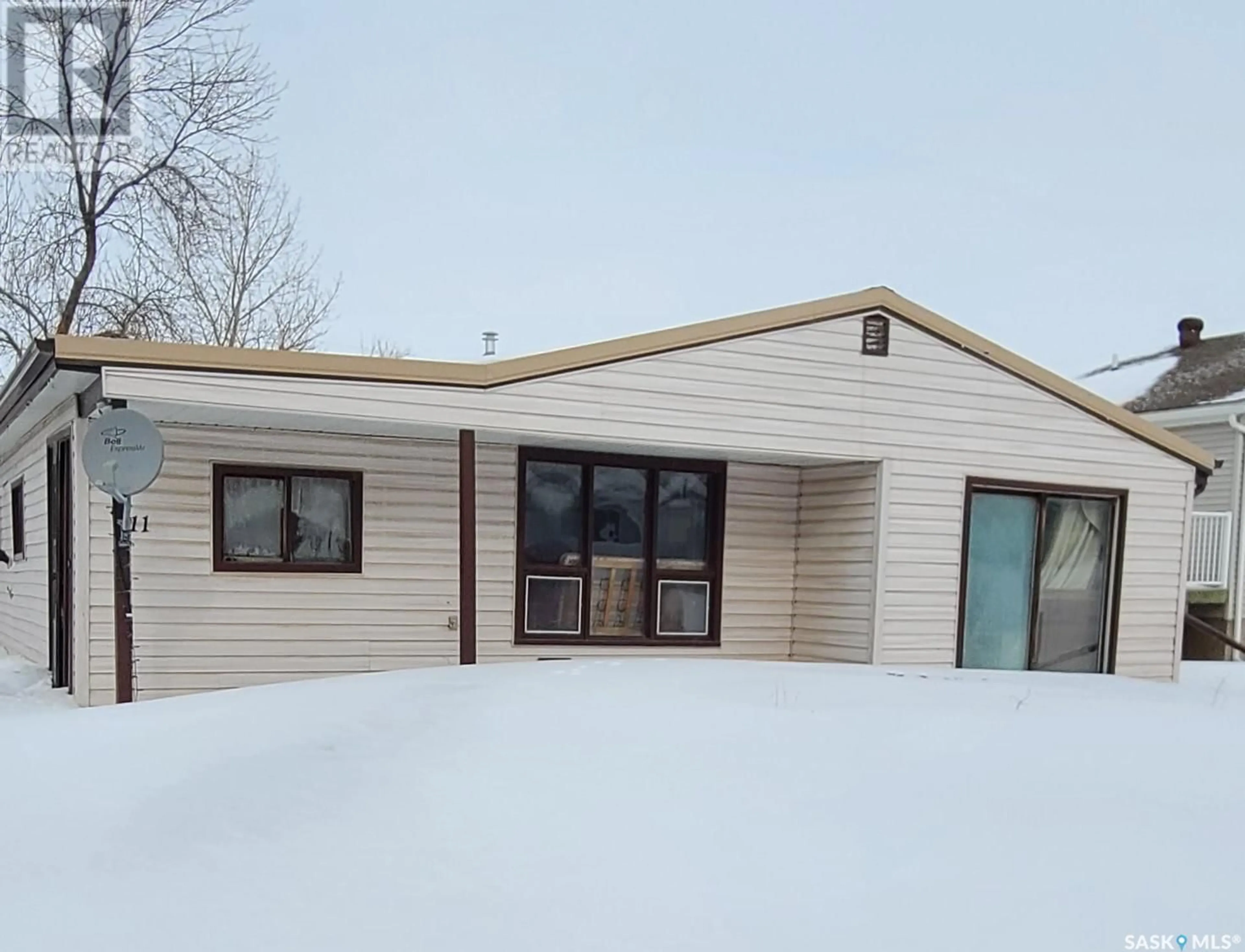 Frontside or backside of a home for 211 2nd AVENUE, Lampman Saskatchewan S0C0B5